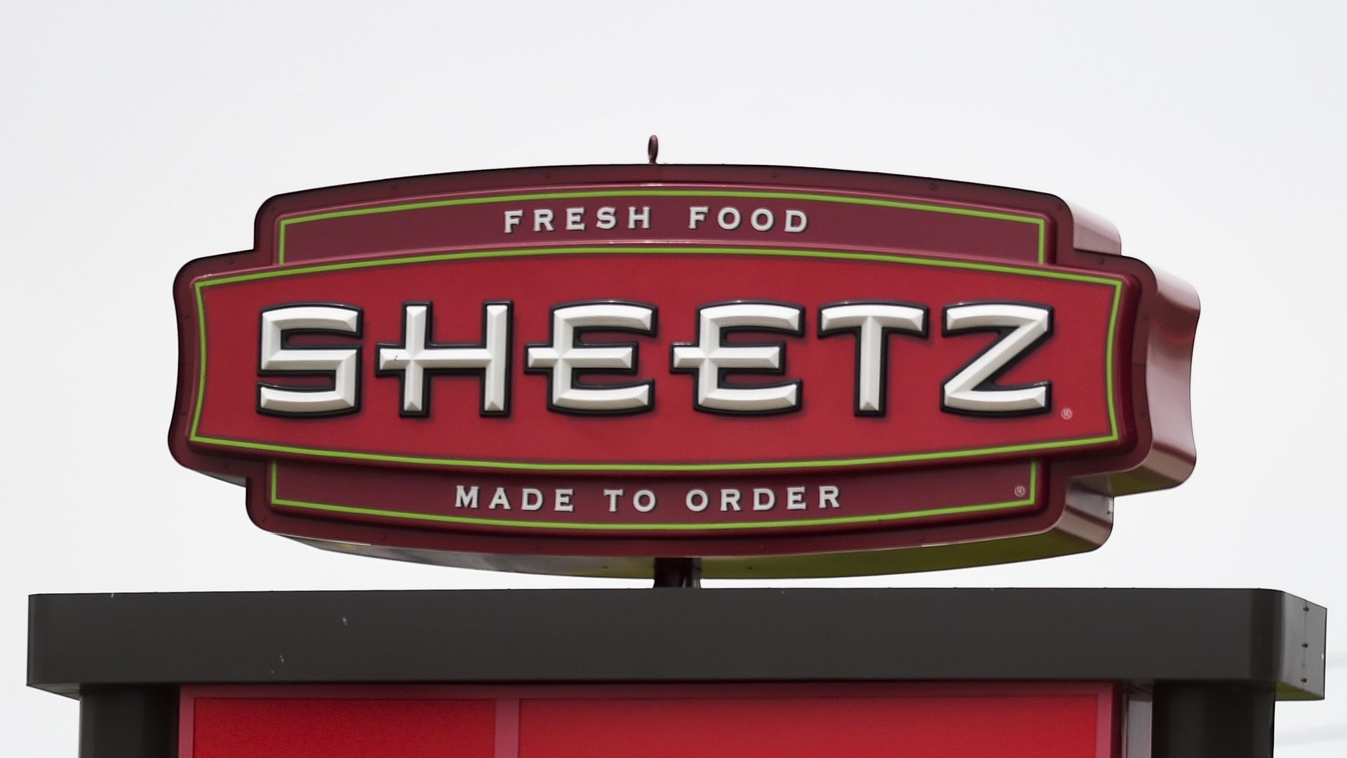 Red Sheetz sign with green outline, featuring the text "Fresh Food" on top and "Made to Order" below the brand name.