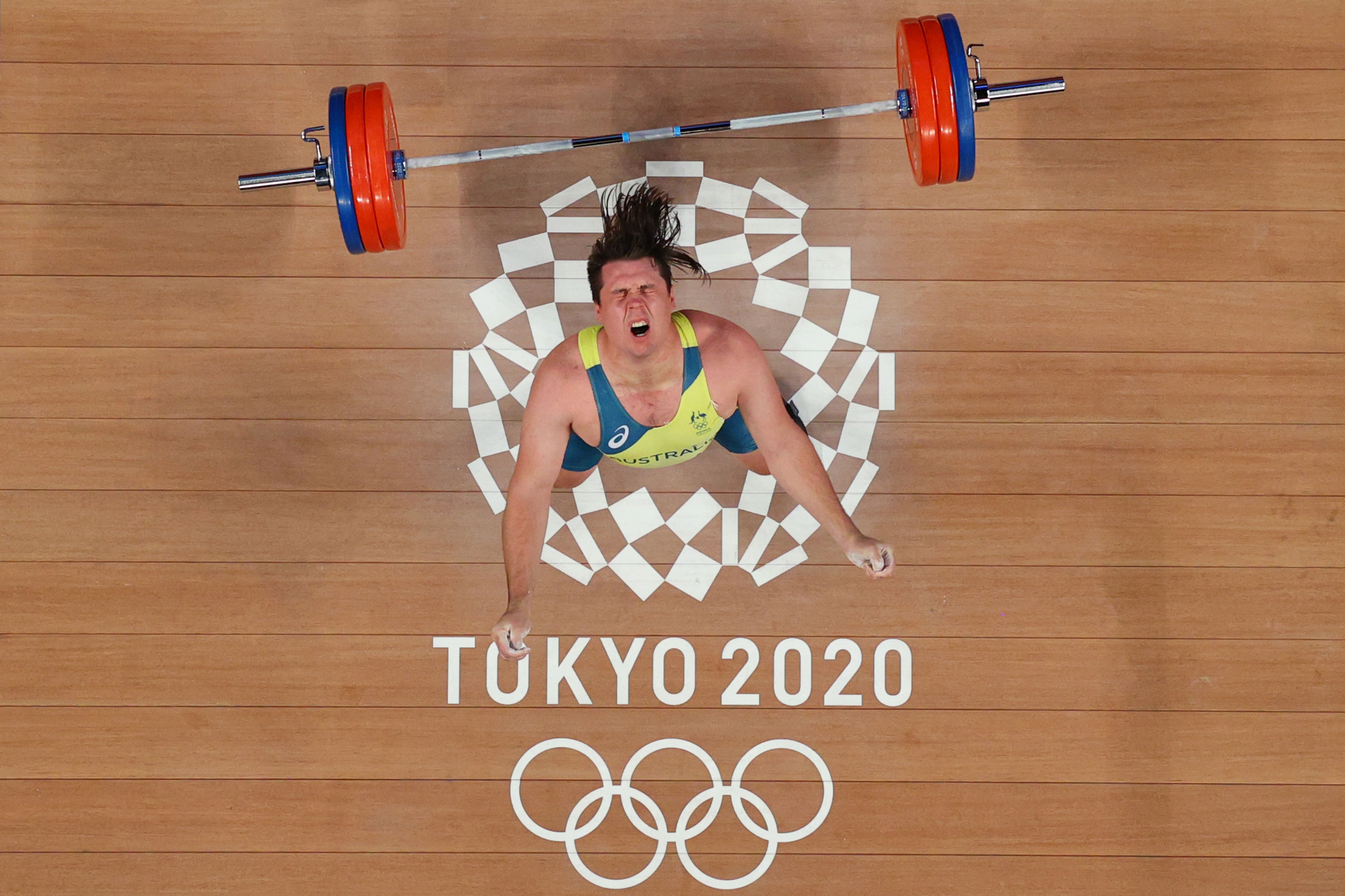 Australia's Matthew Ryan Lydement reacts after missing an attempt during the men's 109kg weightlifting competition during the Tokyo 2020 Olympic Games