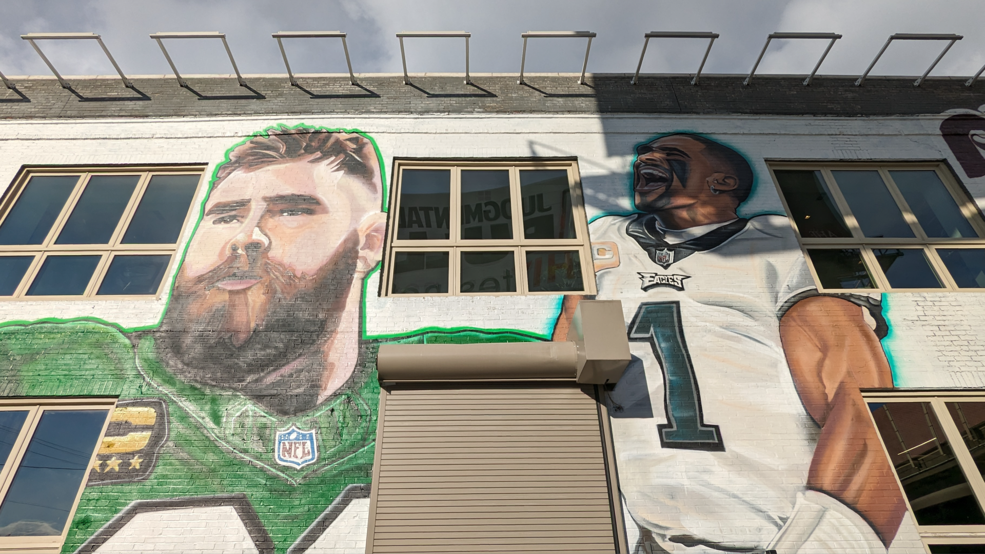 Murals of Jason Kelce and Jalen Hurts