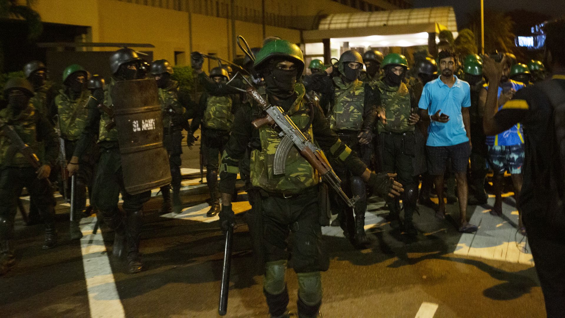 Members of Sri Lankan security forces patrol the Presidential Secretariat on July 22, 2022 in Colombo, Sri Lanka.