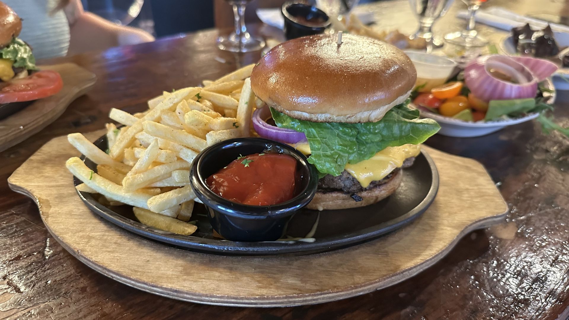 A photo of a burger and fries.