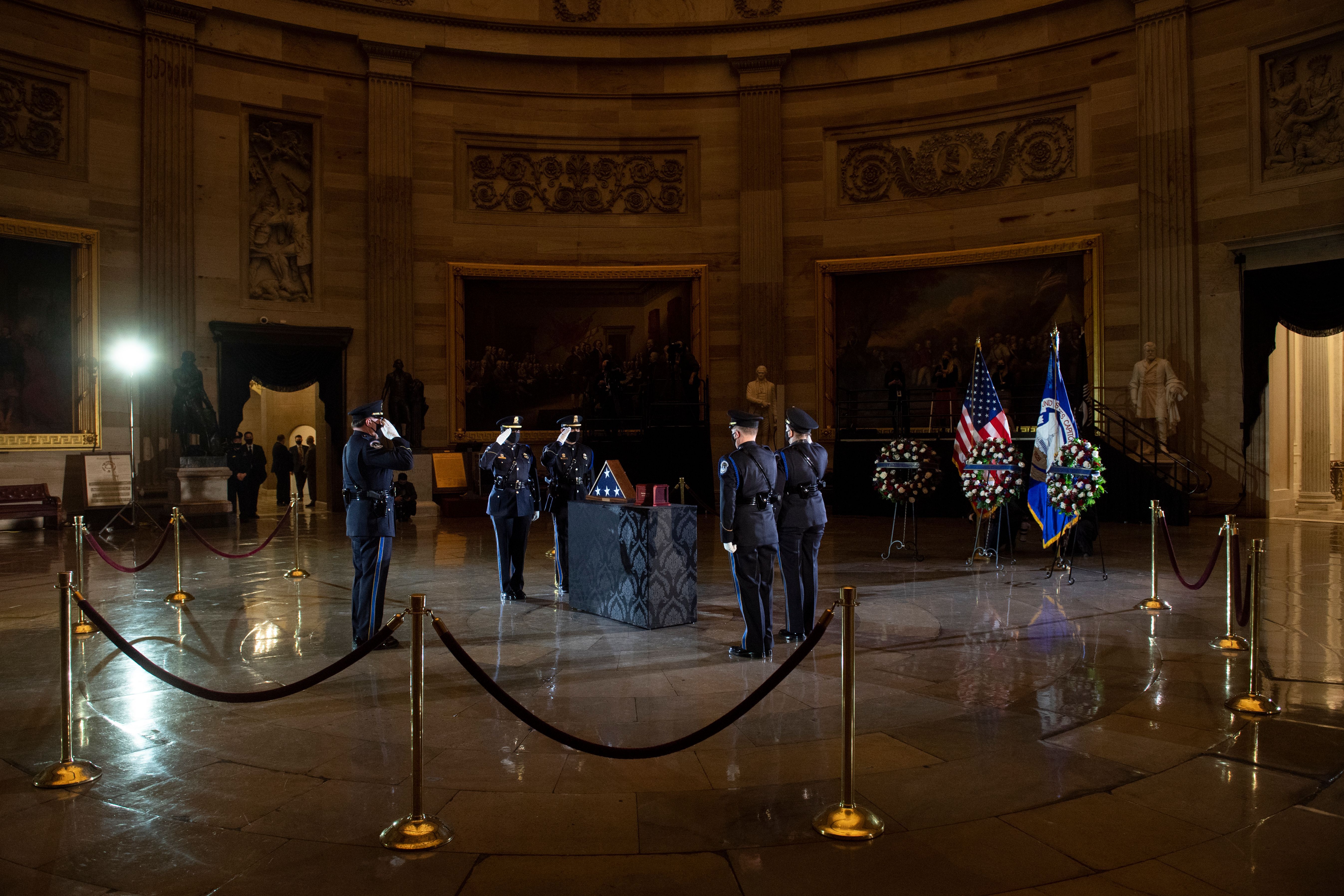 The remains of Capitol Police officer Brian Sicknick lay in honor in the Rotunda of the US Capitol in Washington, DC