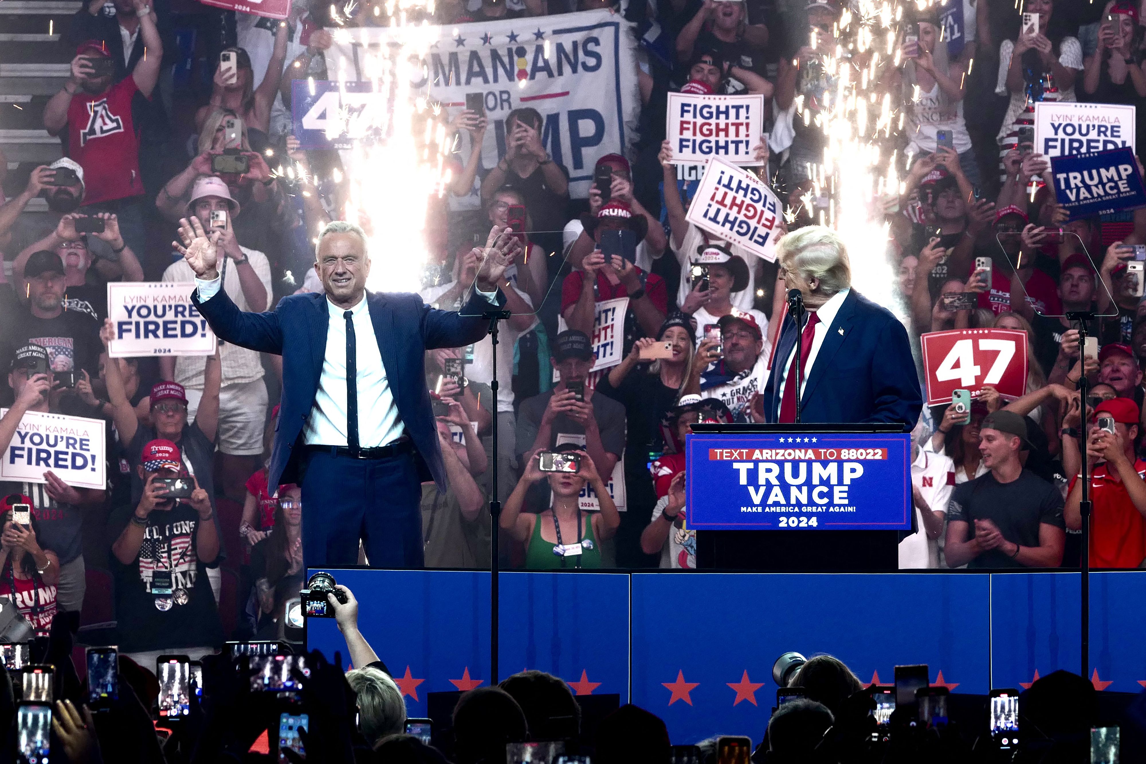 RFK Jr. and former President Trump Trump during a campaign rally in Glendale, Ariz., in August. Photo: Olivier Touron/AFP via Getty Images