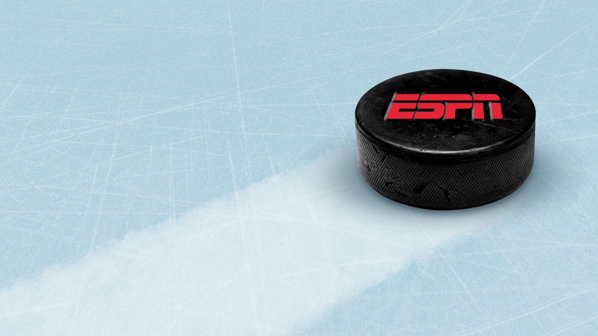 Illustration of a hockey puck with the ESPN logo on it sliding across the ice.   