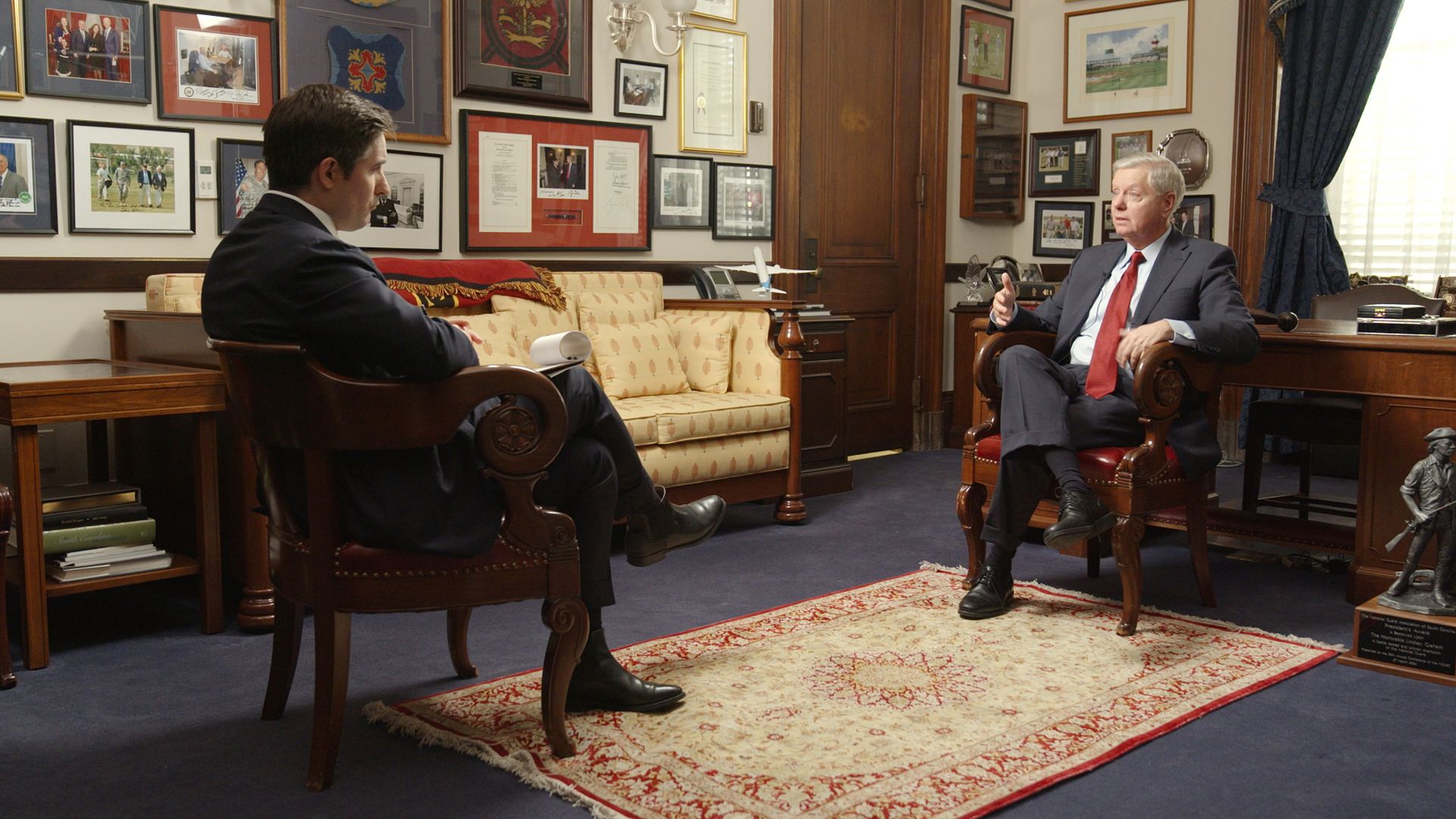 Senator Lindsey Graham is seen speaking with Jonathan Swan for 