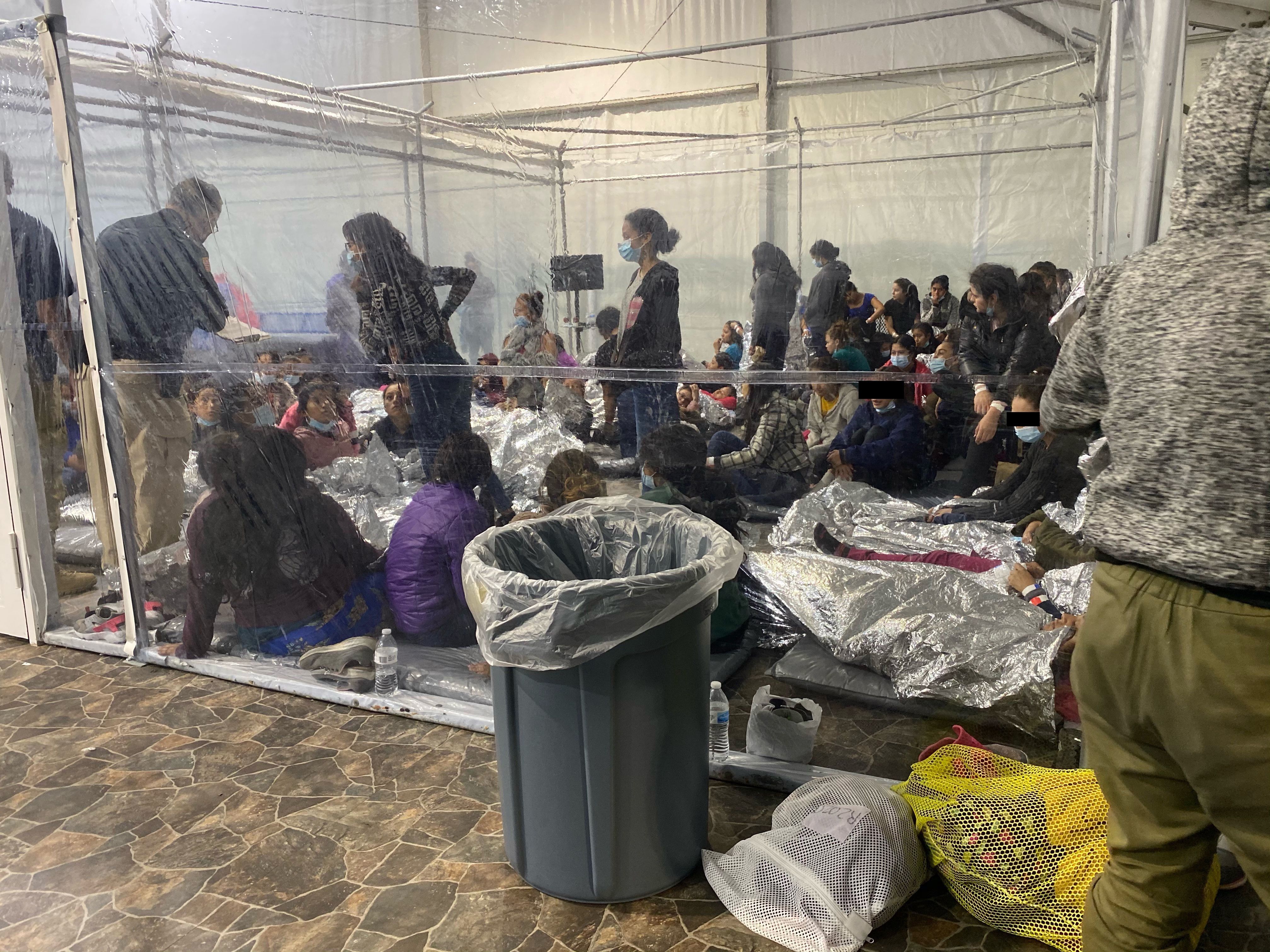 Migrants crowded in border facility in Donna, Texas