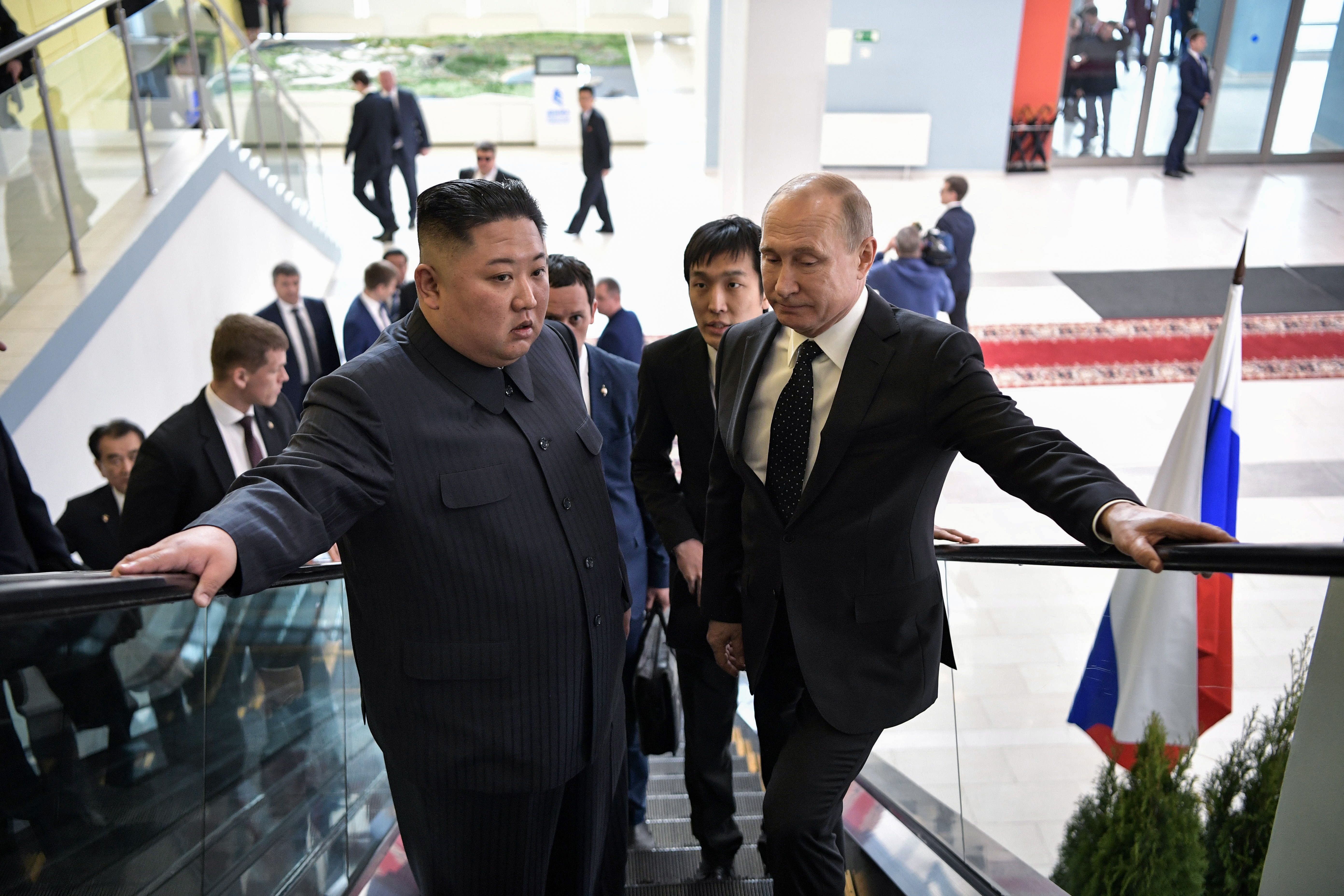 North Korean Leader Kim Jong Un and Russia's President Vladimir Putin (L-R front) during a meeting at the Far Eastern Federal University (FEFU) on Russky Island. 