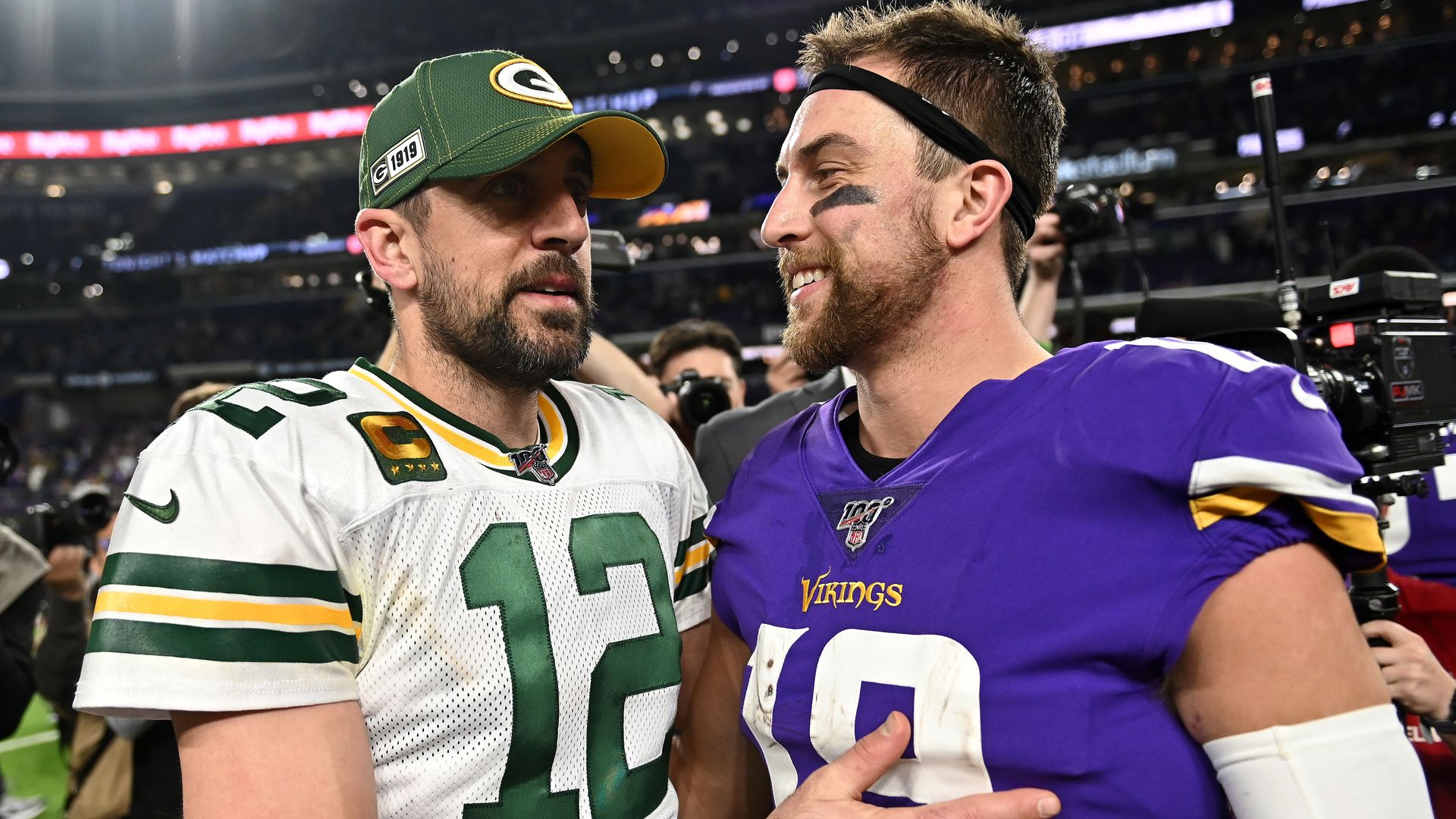 Aaron Rodgers embraces Adam Thielen after a Vikings game
