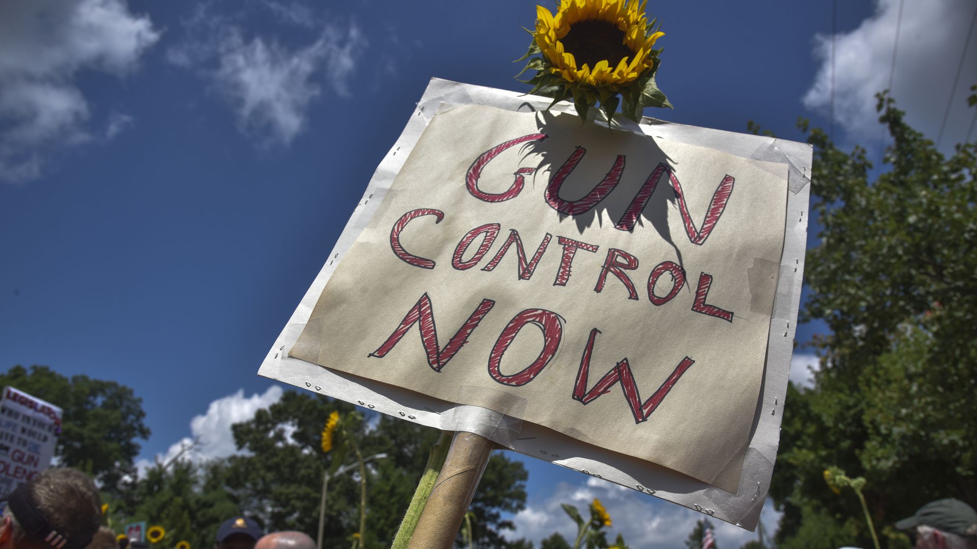 A gun control now sign
