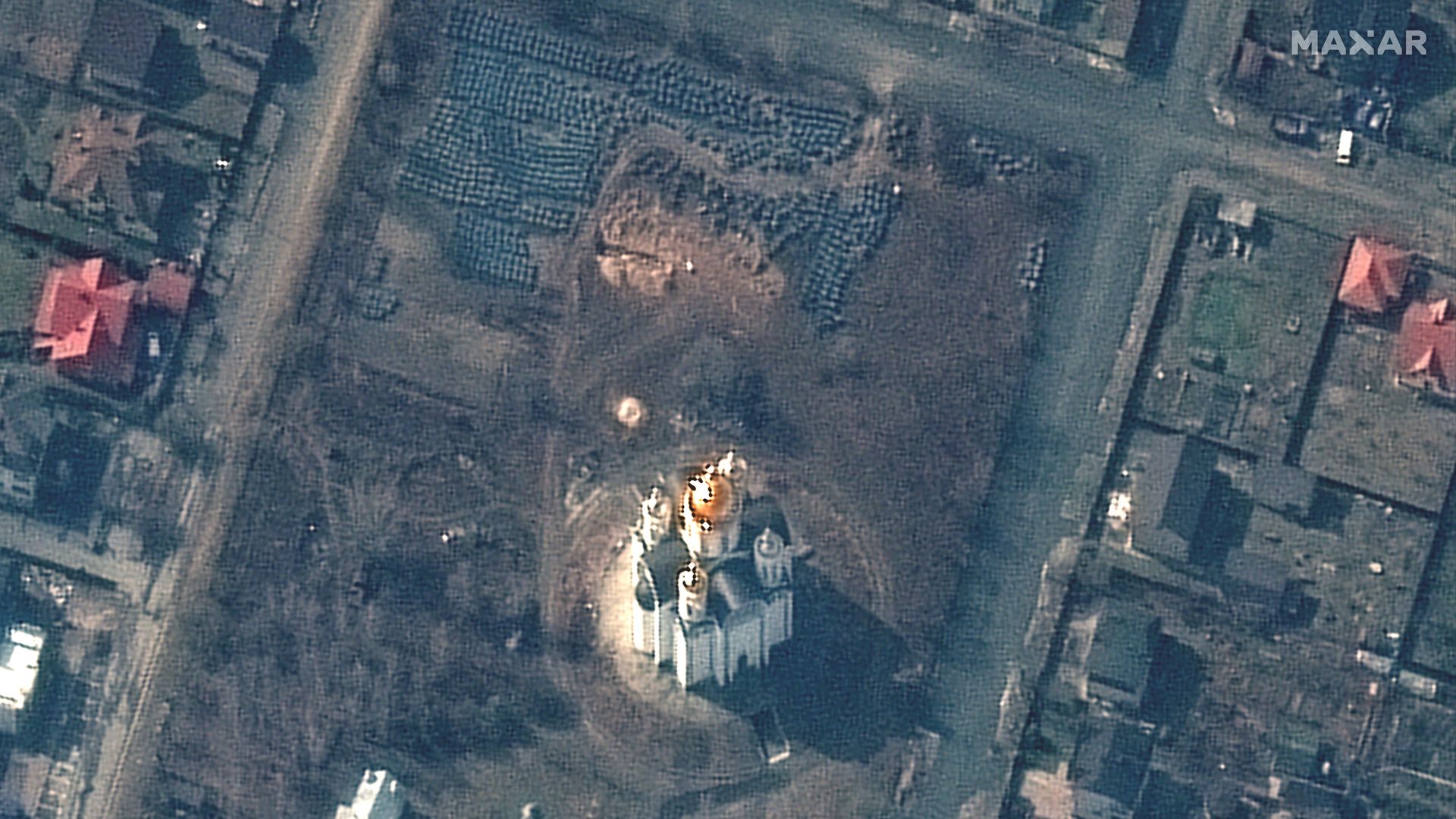 Satellite imagery of a probable mass grave site near the church of St. Andrew and Pyervozvannoho in Bucha, Ukraine, captured on March 31. 