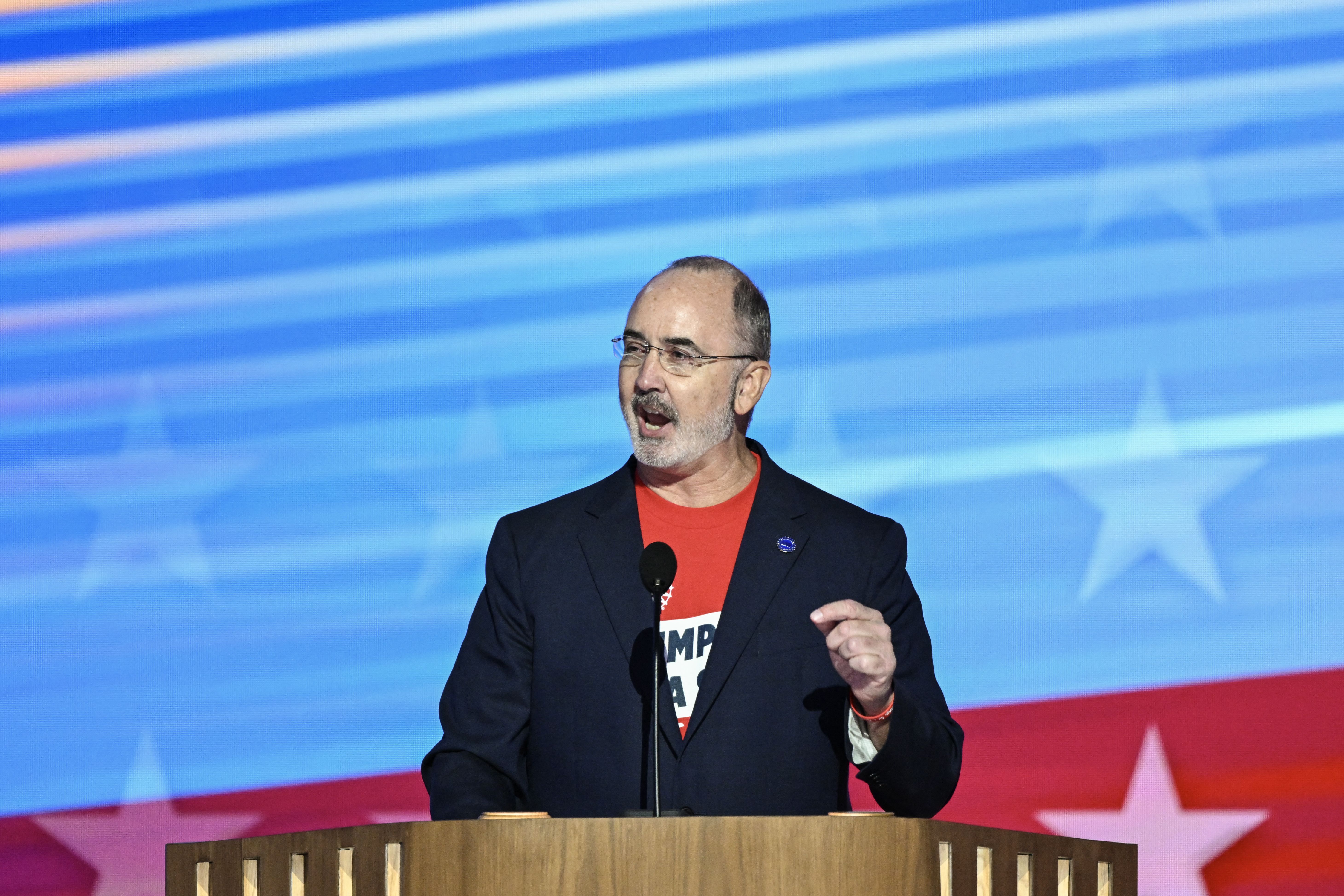 United Automobile Workers (UAW) President Shawn Fain speaks on the first day of the Democratic National Convention (DNC) at the United Center in Chicago, Illinois, on August 19, 2024. 