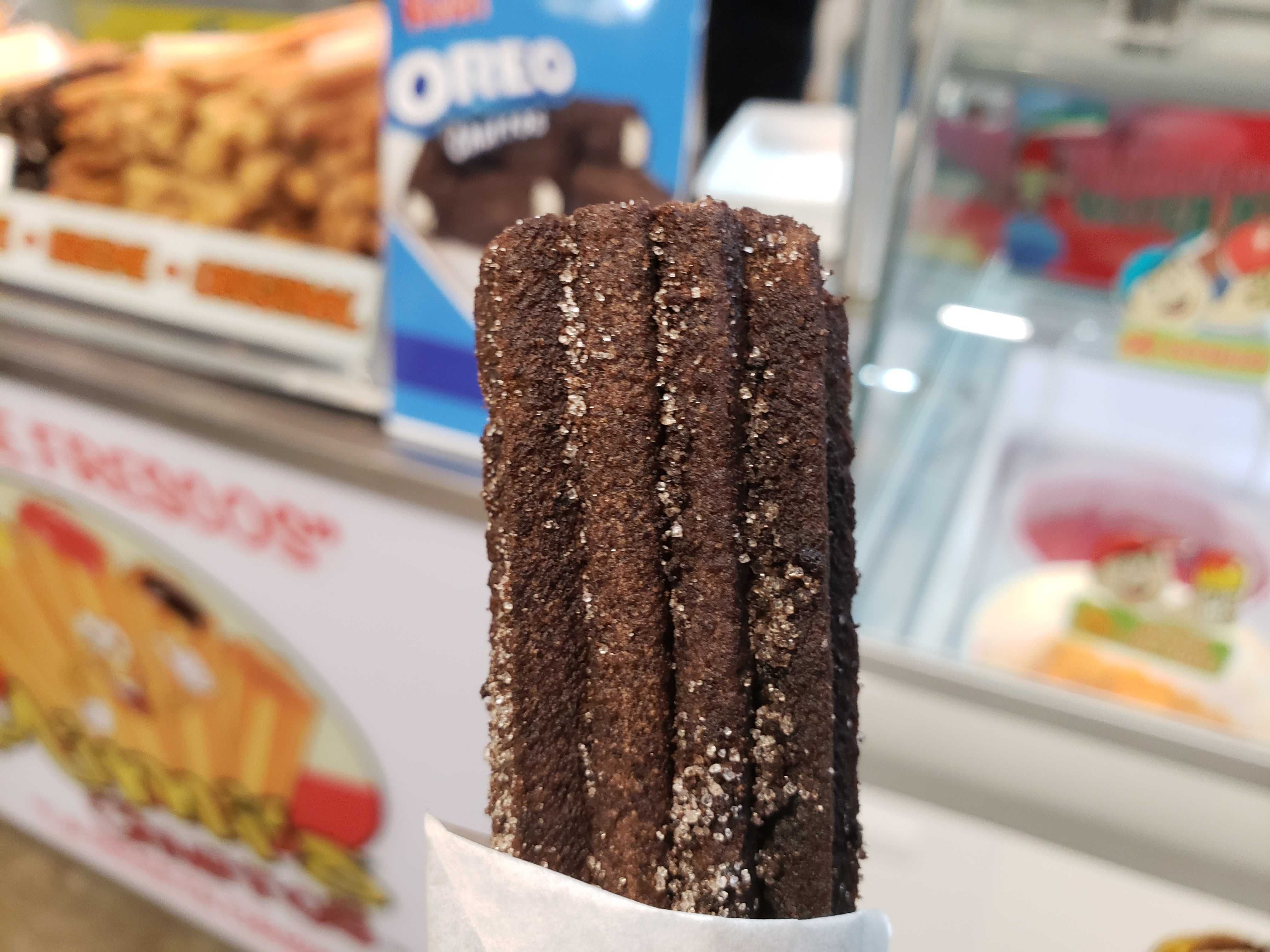 Photo of a oreo-flavored cchurro on a stick.