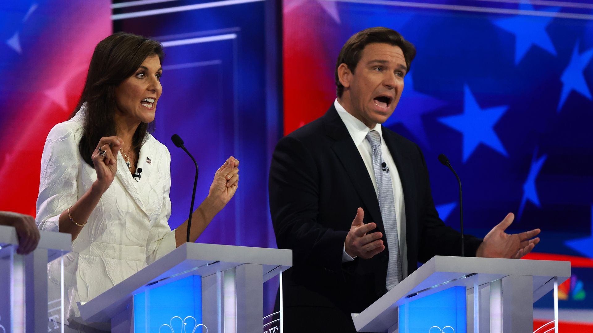 Nikki Haley and Ron DeSantis both speaking at the same time during a Republican primary debate in Miami in November 2023.