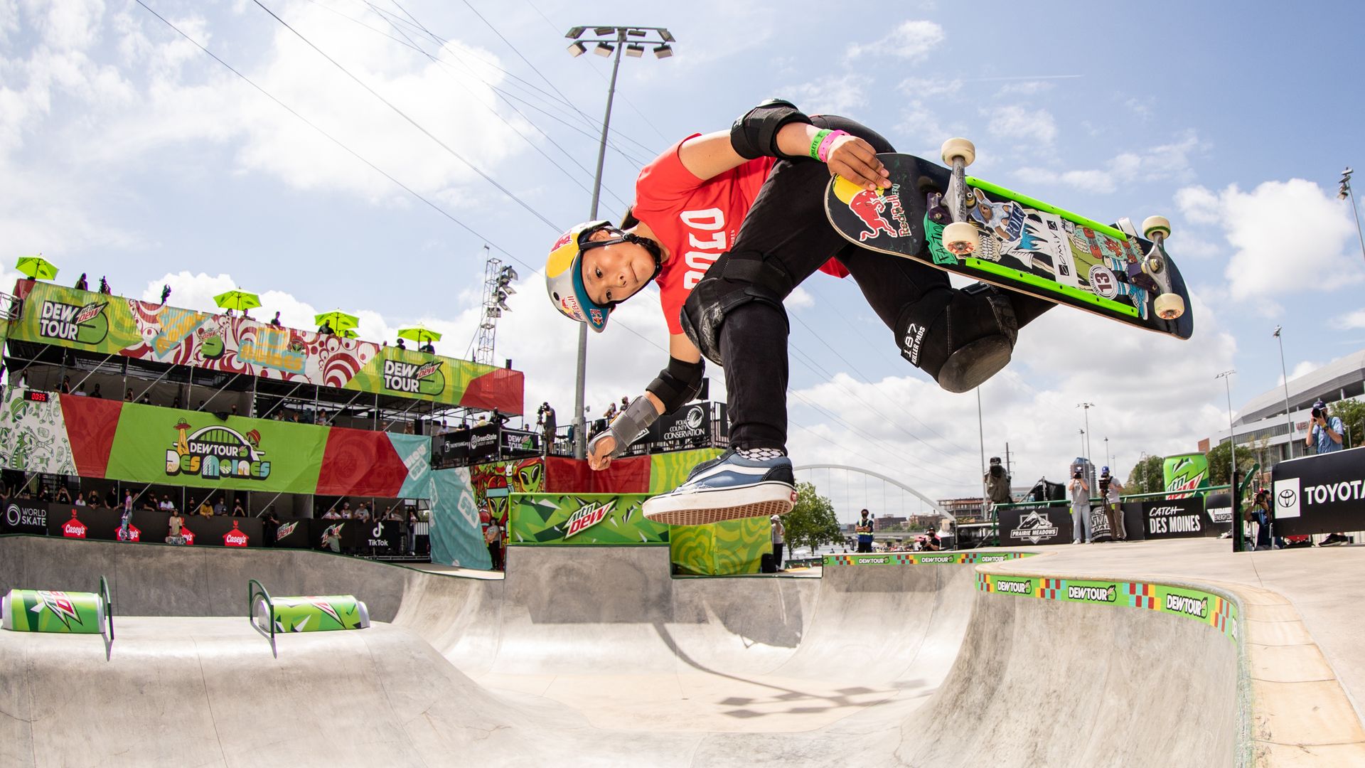 Sakura Yosozumi on her skateboard at the Dew Tour in Des Moines.
