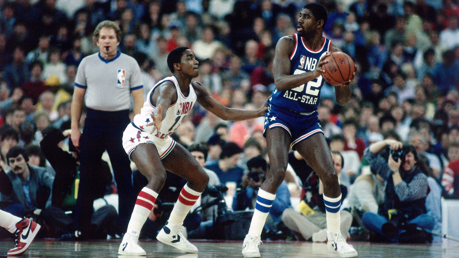 Two basketball players on a court