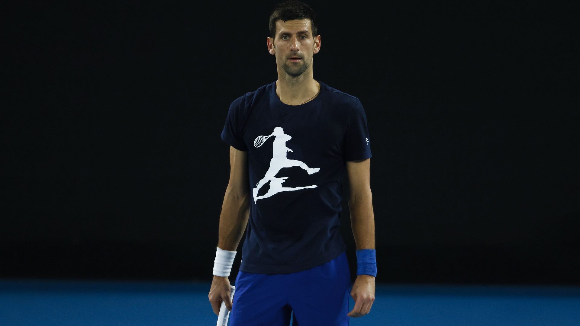  Novak Djokovic of Serbia looks on during a practice session ahead of the 2022 Australian Open at Melbourne Park on January 14, 2022 in Melbourne, Australia.