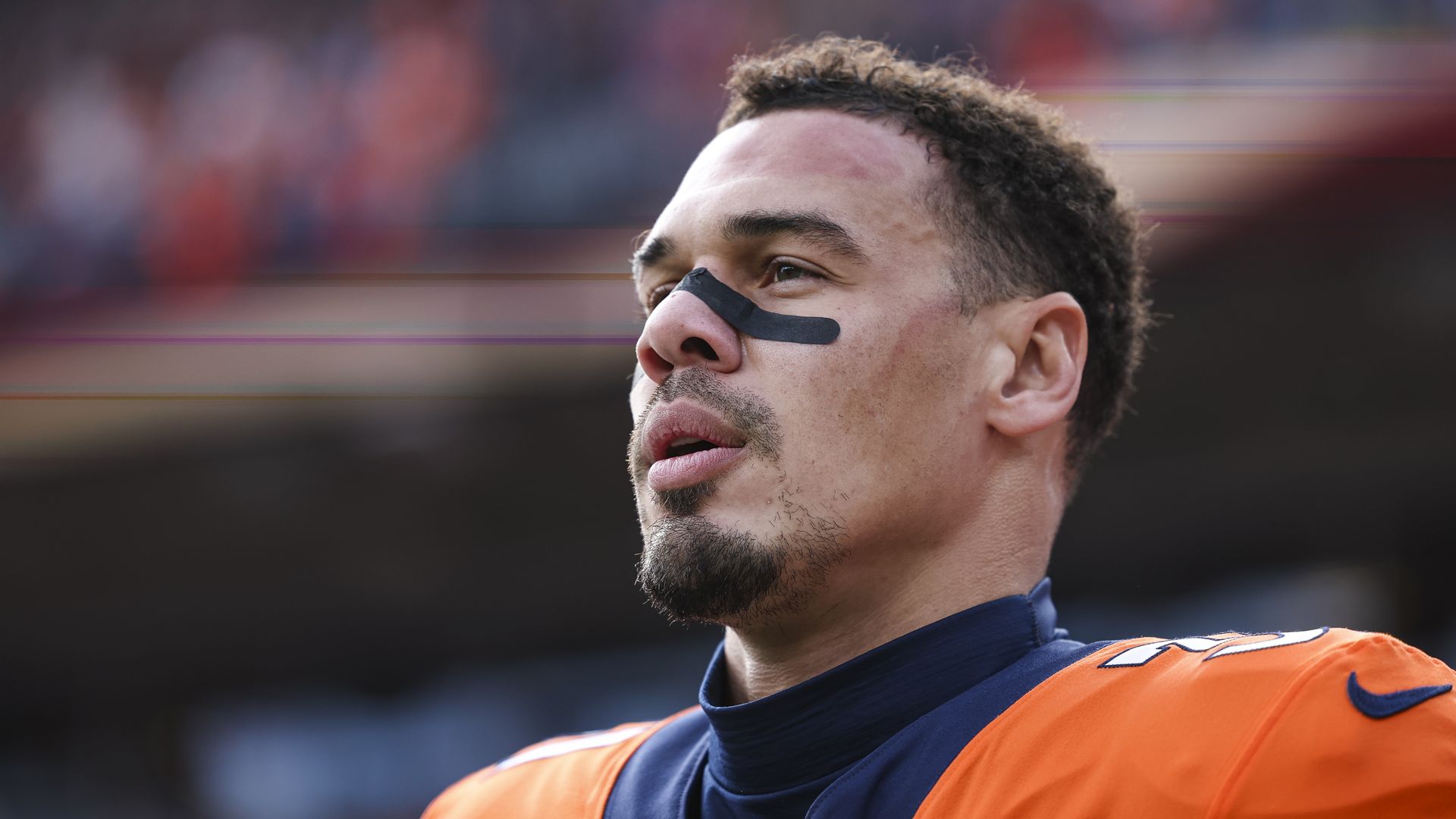 Justin Simmons looks on from the sideline at Empower Field at Mile High on Dec. 31, 2023. Photo: Perry Knotts/Getty Images