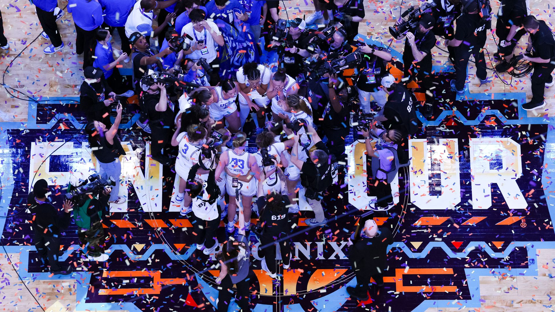 The UCLA Bruins celebrate after defeating South Carolina Gamecocks in the NCAA Women's Basketball Championship game at Mortgage Matchup Center on April 5, 2026 in Phoenix, Arizona. 