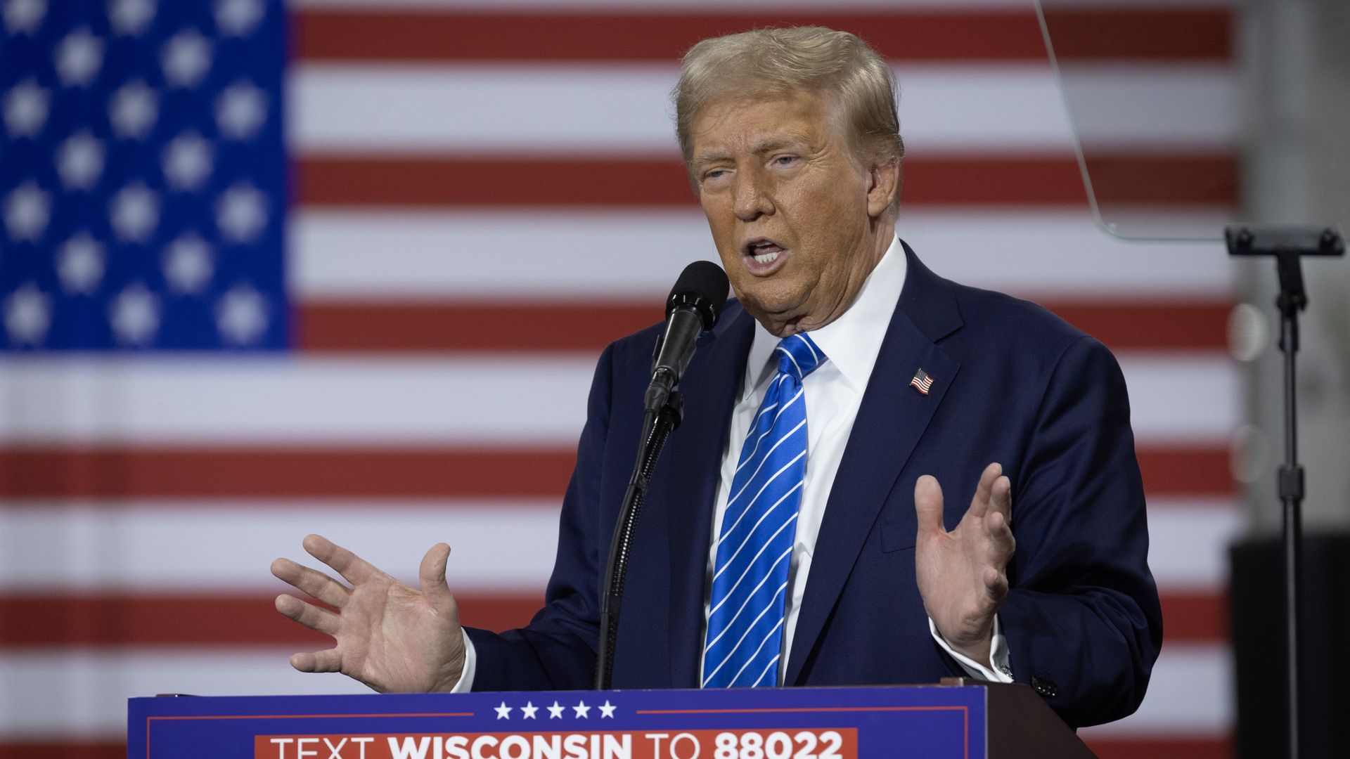 Republican presidential nominee, former U.S. President Donald Trump speaks to guests during a campaign event at Dane Manufacturing on October 01, 2024 in Waunakee, Wisconsin. 