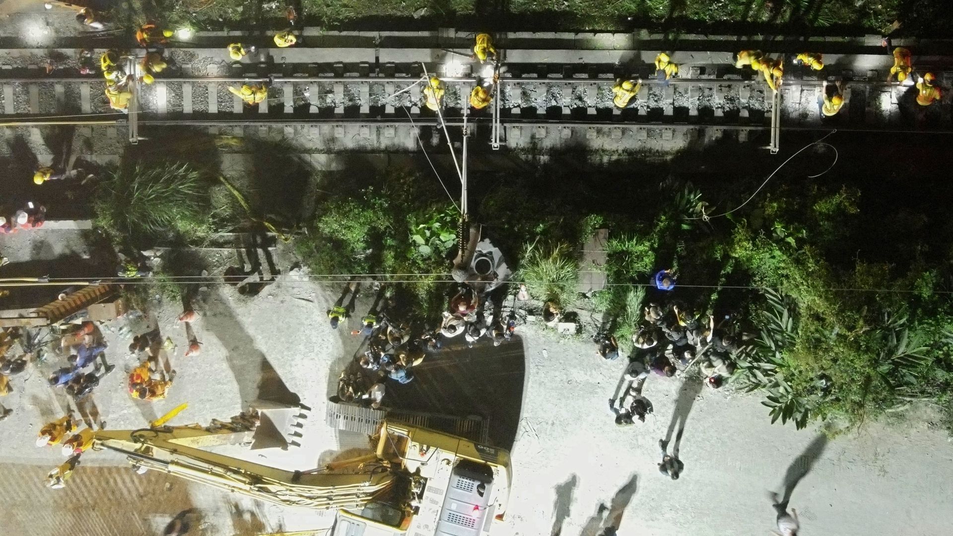 An aerial view of workers repairing damaged rail tracks after a train derailed in eastern Taiwan on April 2.