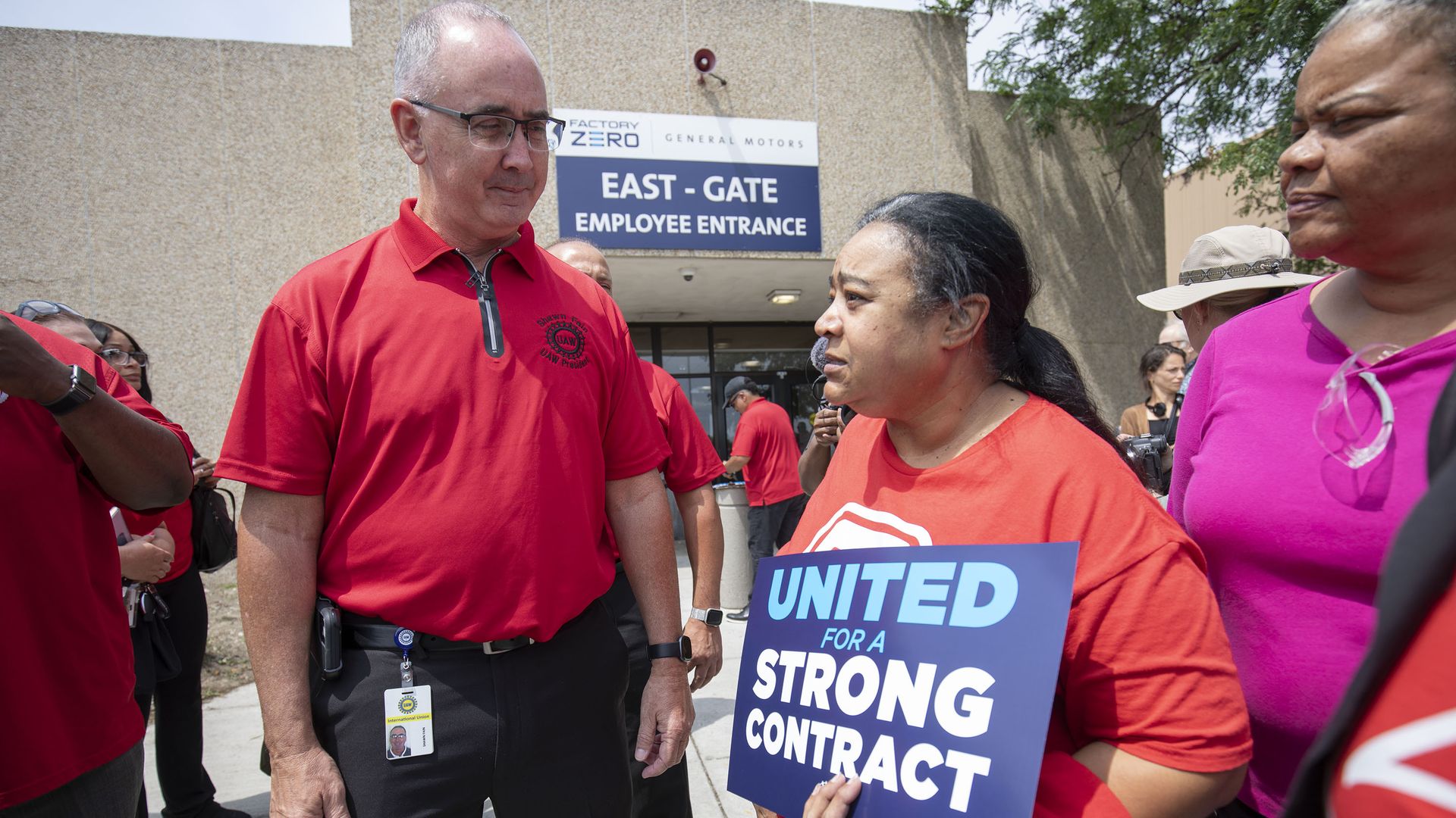 UAW President Shawn Fain meets with local workers at GM's Factory Zero last month wearing a red shirt