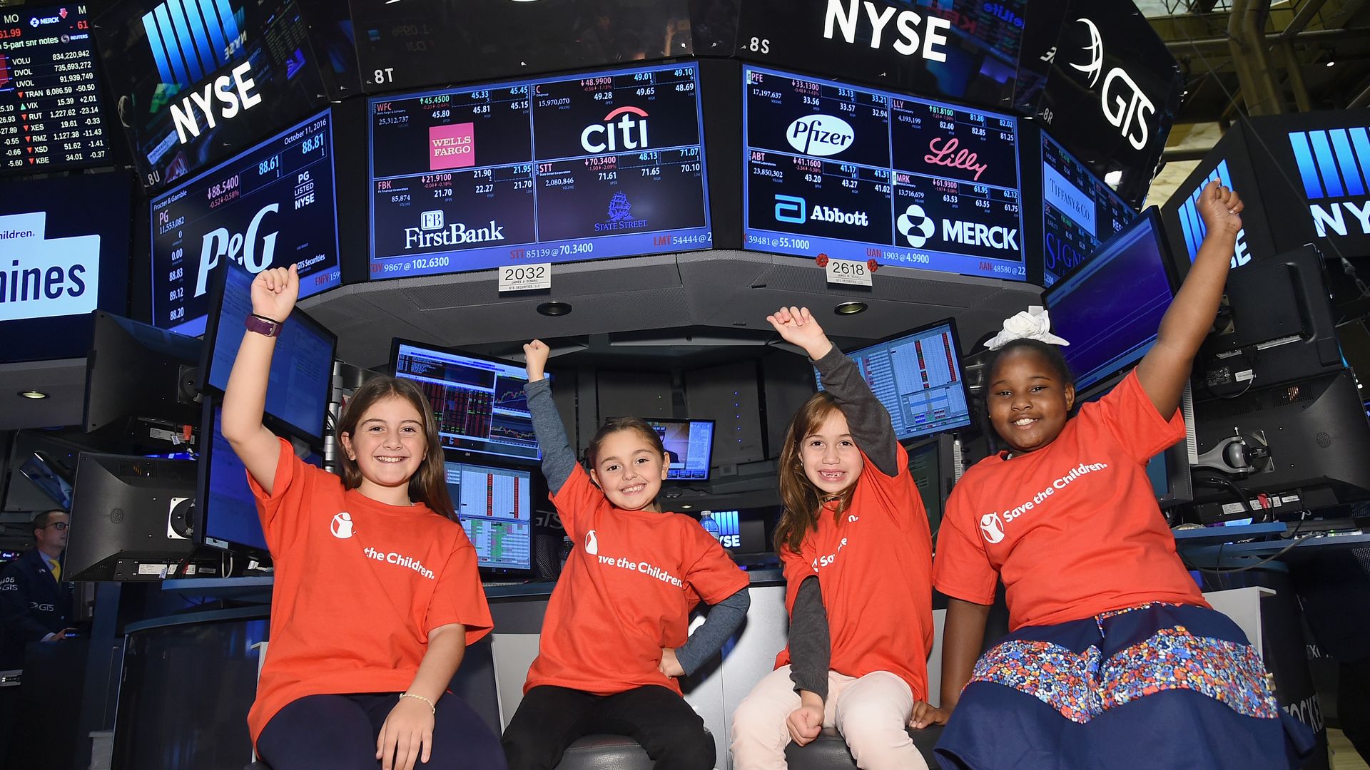 Save the Children girls at the stock market