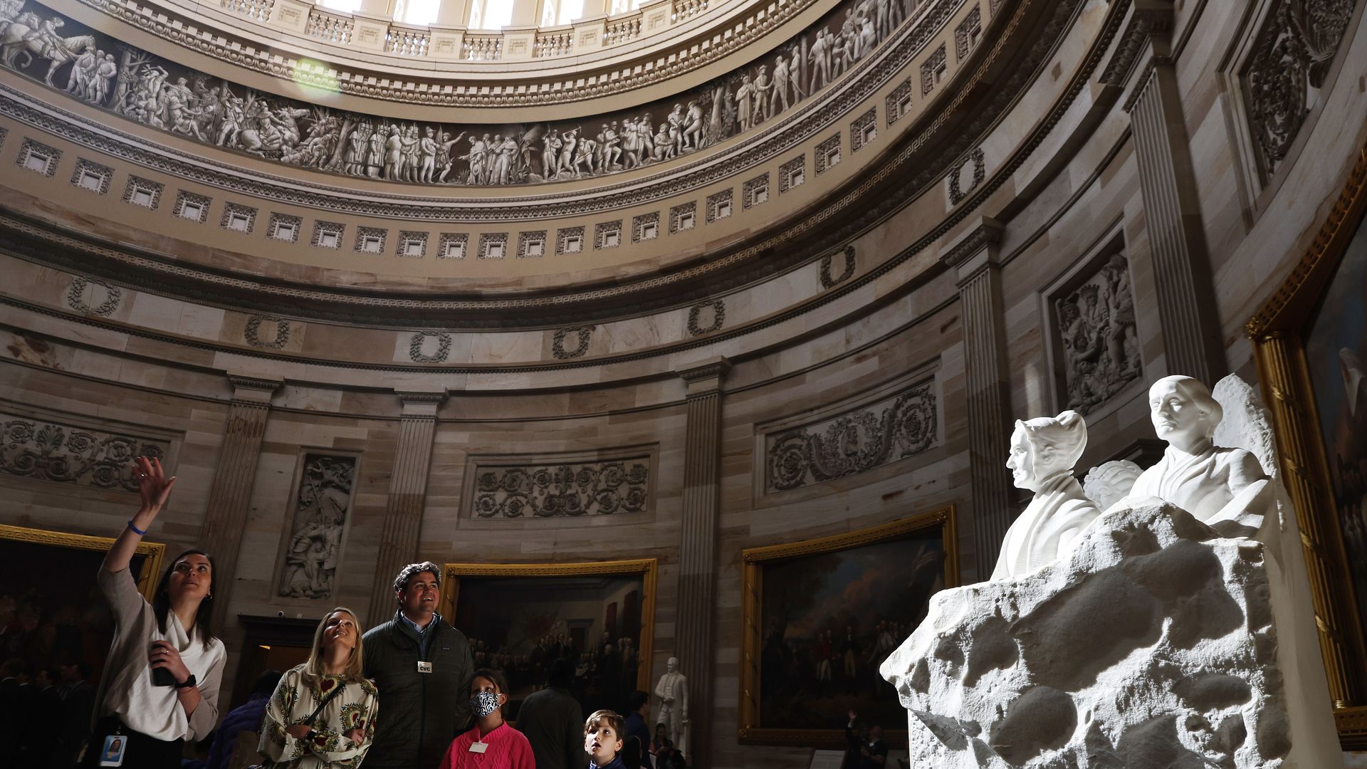 Members of the public are seen looking at the Capitol Dome as public tours resumed.