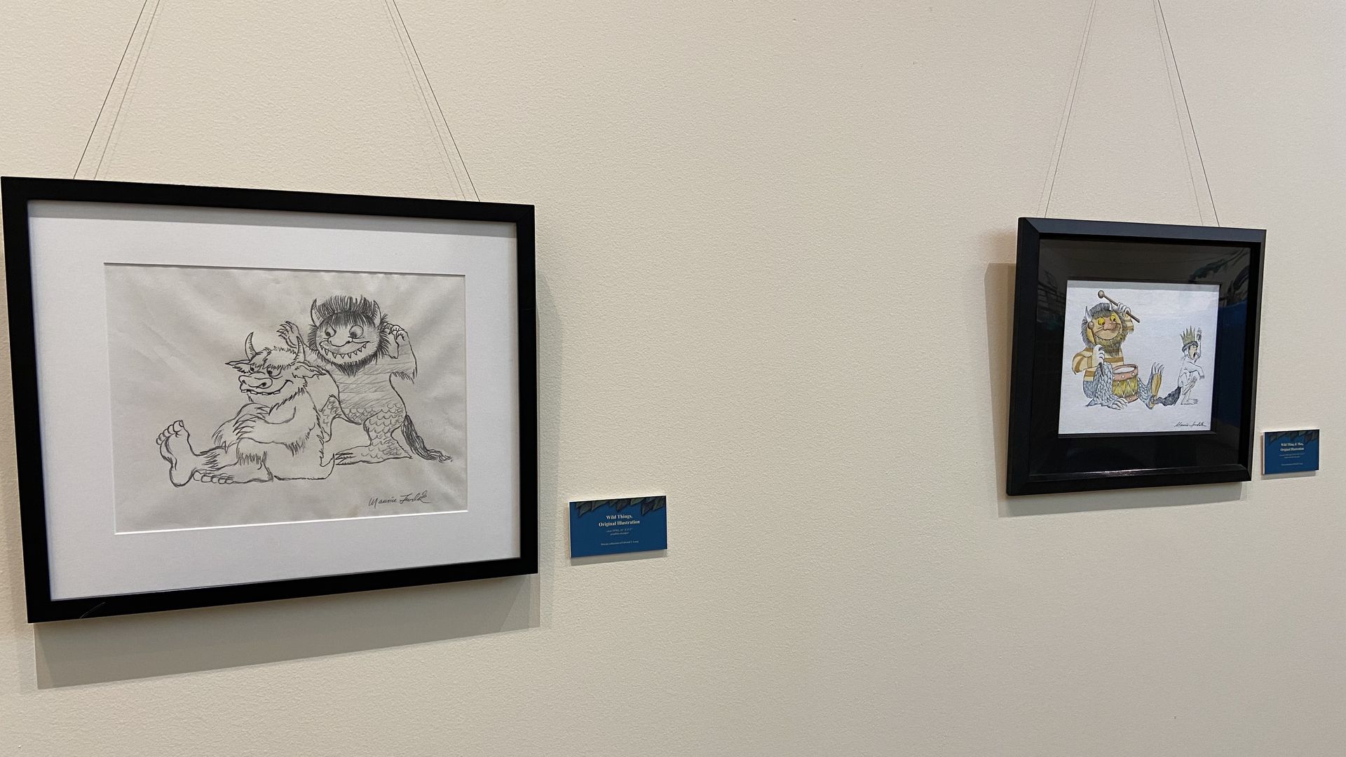 Maurice Sendak sketches hang on a wall