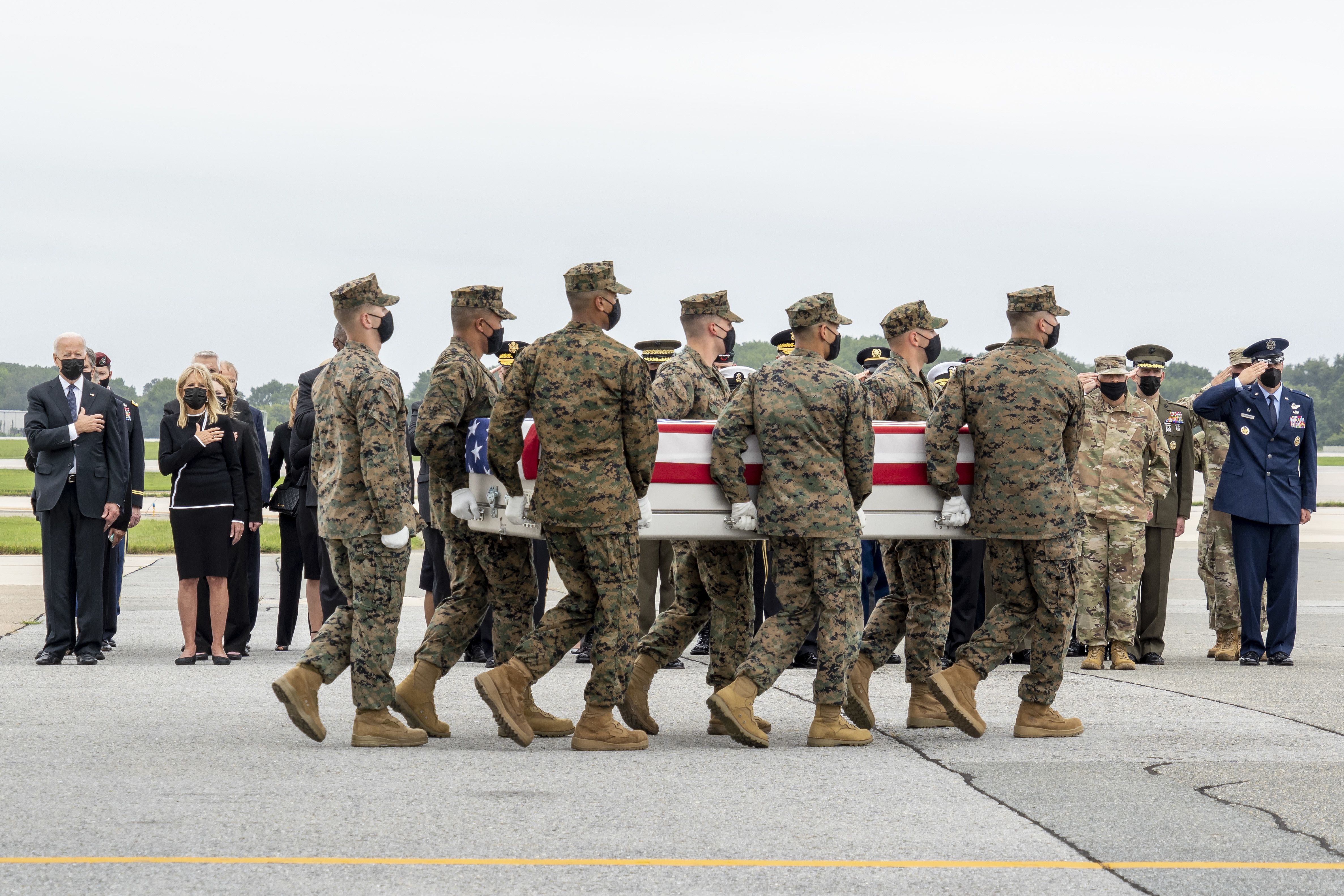  A U.S. Marine Corps carry team transfers the remains of Marine Corps Cpl. Daegan W. Page, who was killed in the 2021 Kabul Airport blast.