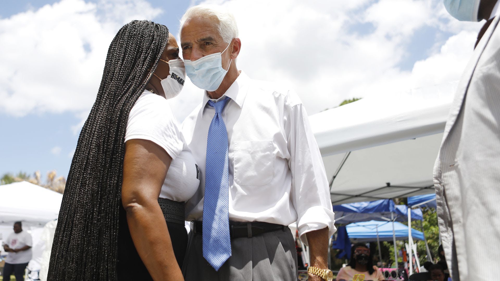 Joyce Ward talks with Rep. Charlie Crist (D-FL) at her vendor booth during the Black Lives Matters Business Expo