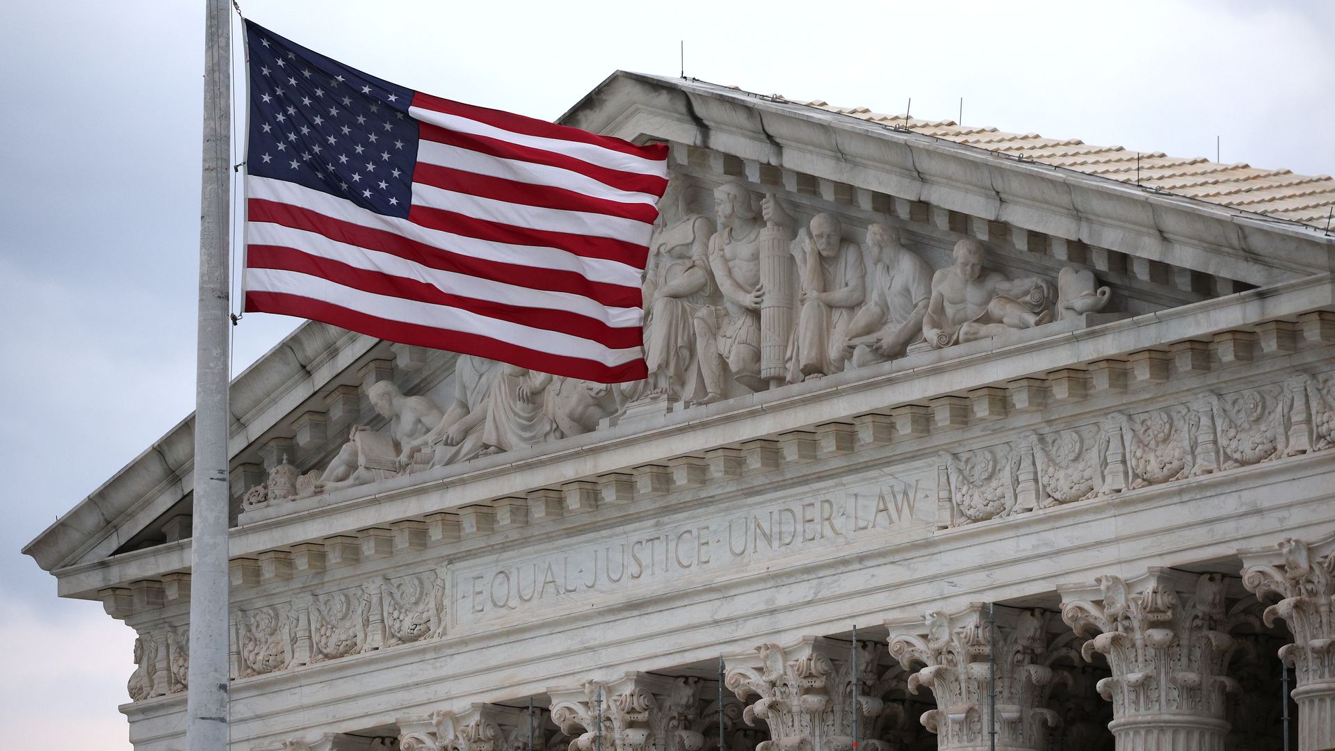 American flag in front of the Supreme Court