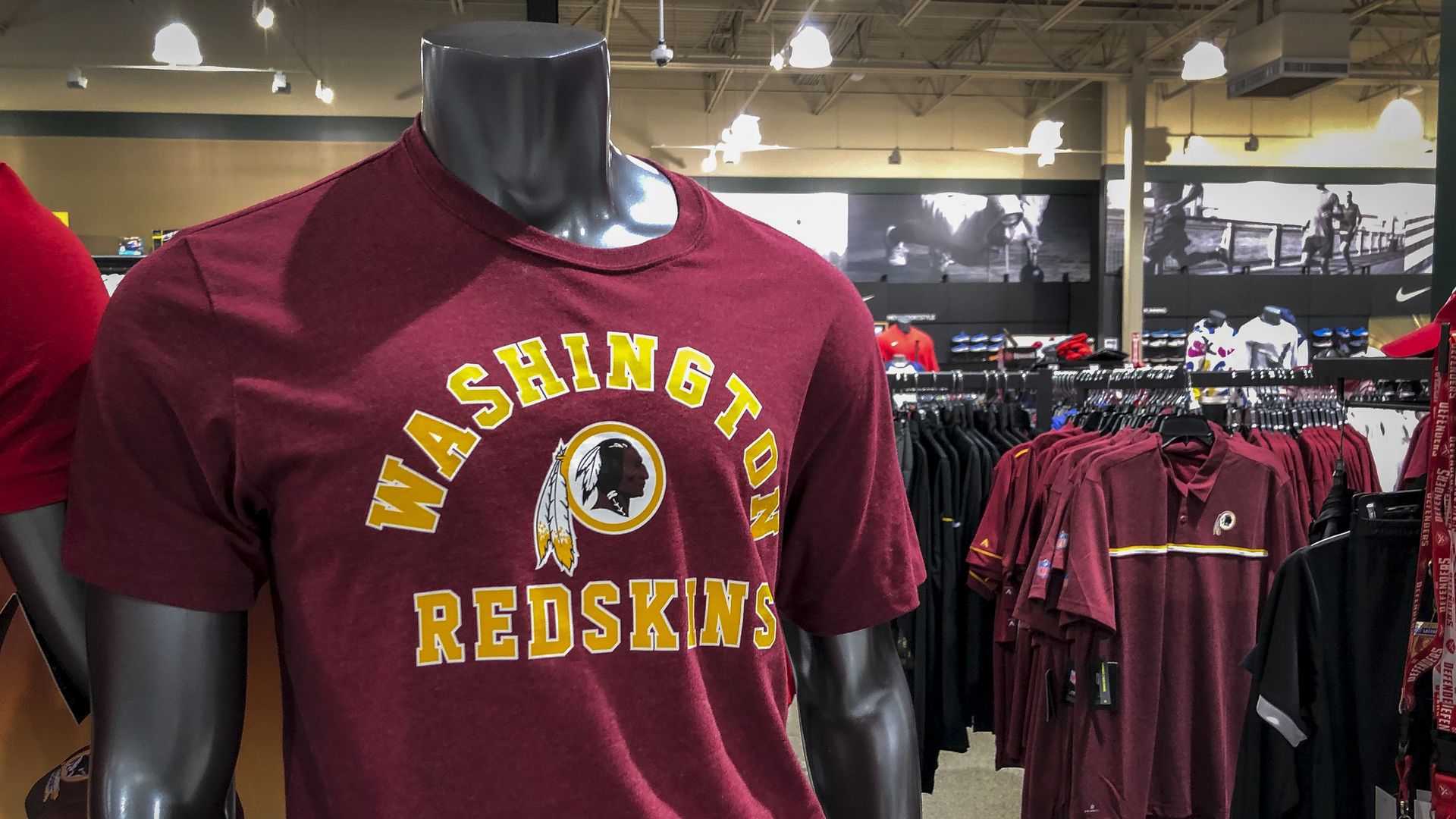 A T shirt with the Washington Redskins logo on it