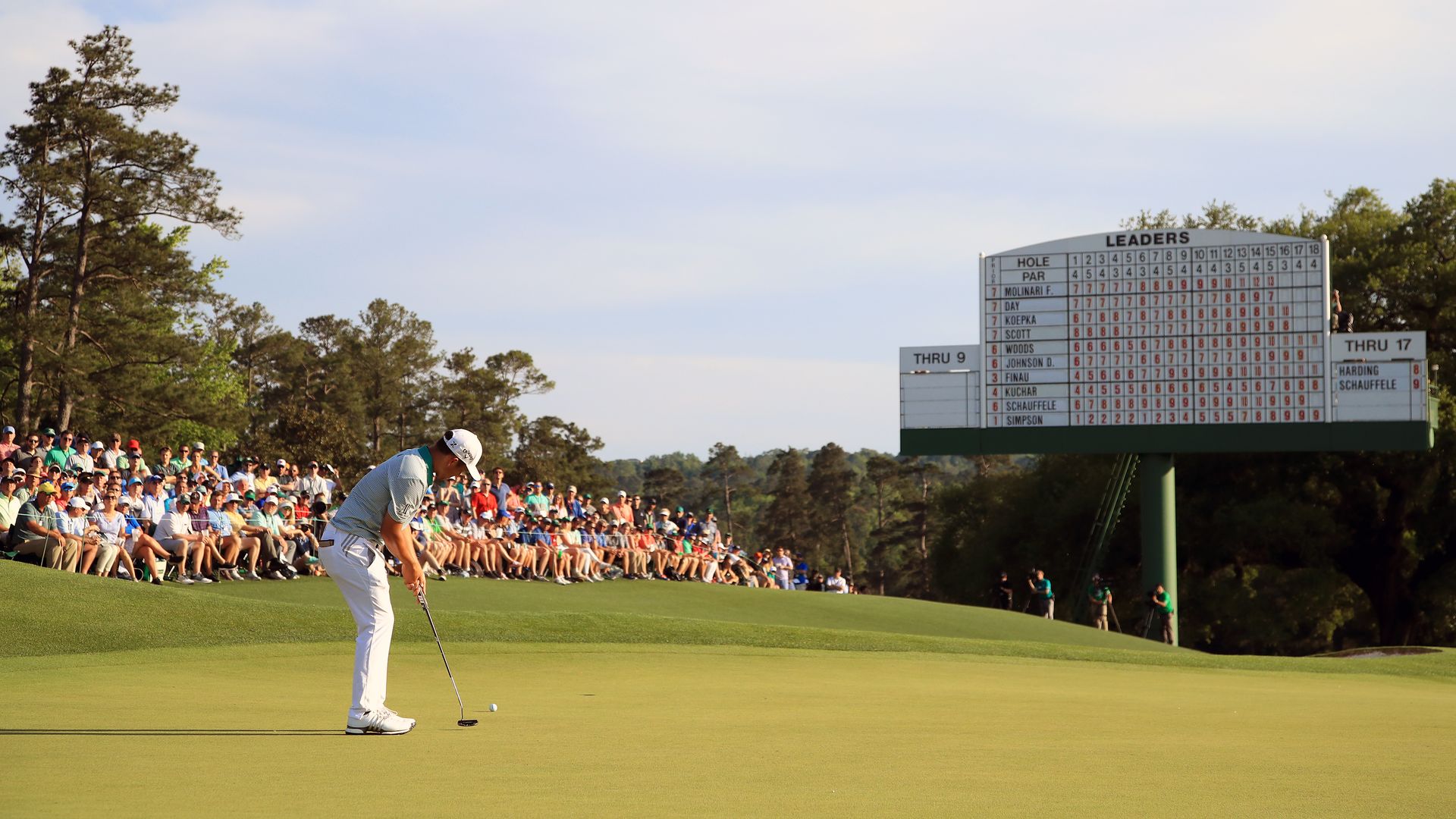 Xander Schauffele of the United States putts on the 18th green during the third round of the Masters at Augusta National Golf Club on April 13, 2019 in Augusta, Georgia.