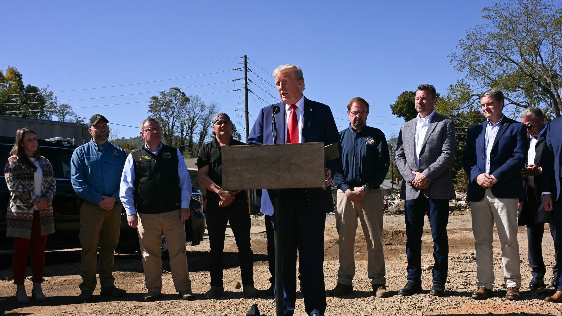 Former US President and Republican presidential candidate Donald Trump speaks to the media in Swannanoa, North Carolina, on October 21, 2024, after observing cleanup efforts in the aftermath of Hurricane Helene, which devastated the region. (Photo by Jim WATSON / AFP) (Photo by JIM WATSON/AFP via Ge
