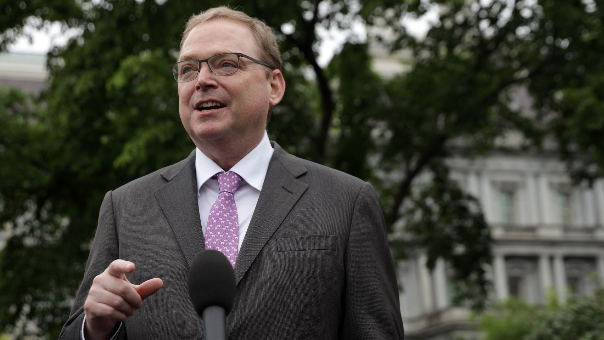 Kevin Hassett stands in front of a microphone outside the White House