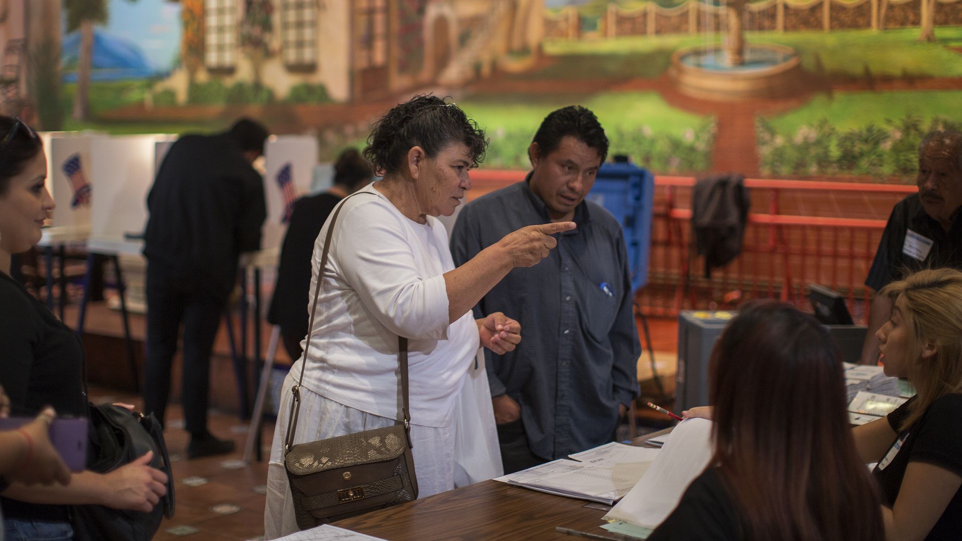  Latinos vote at a polling station in El Gallo Restaurant in 2016 in the Boyle Heights section of Los Angeles.