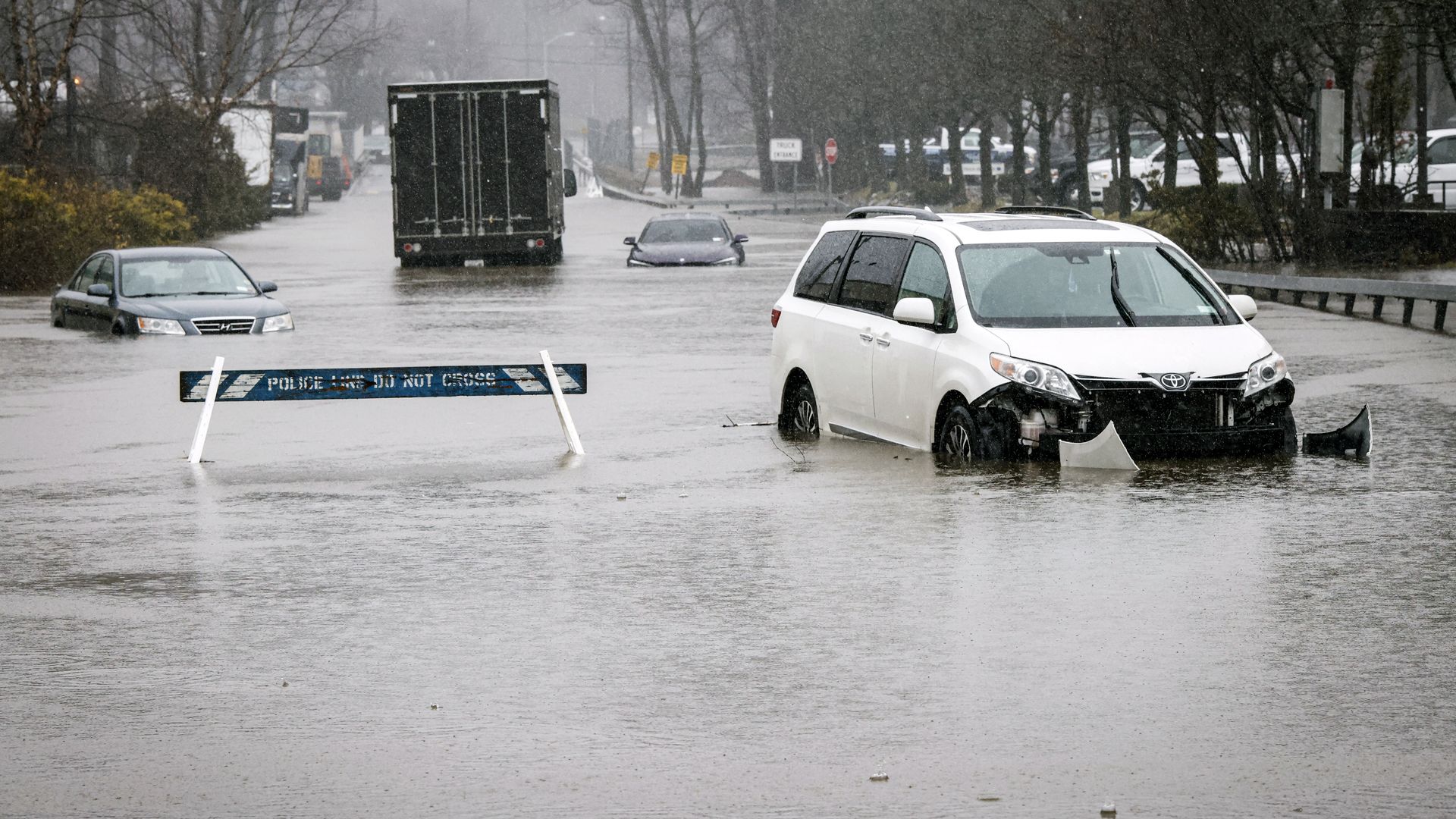 Abandoned cars in flood waters in New York. 