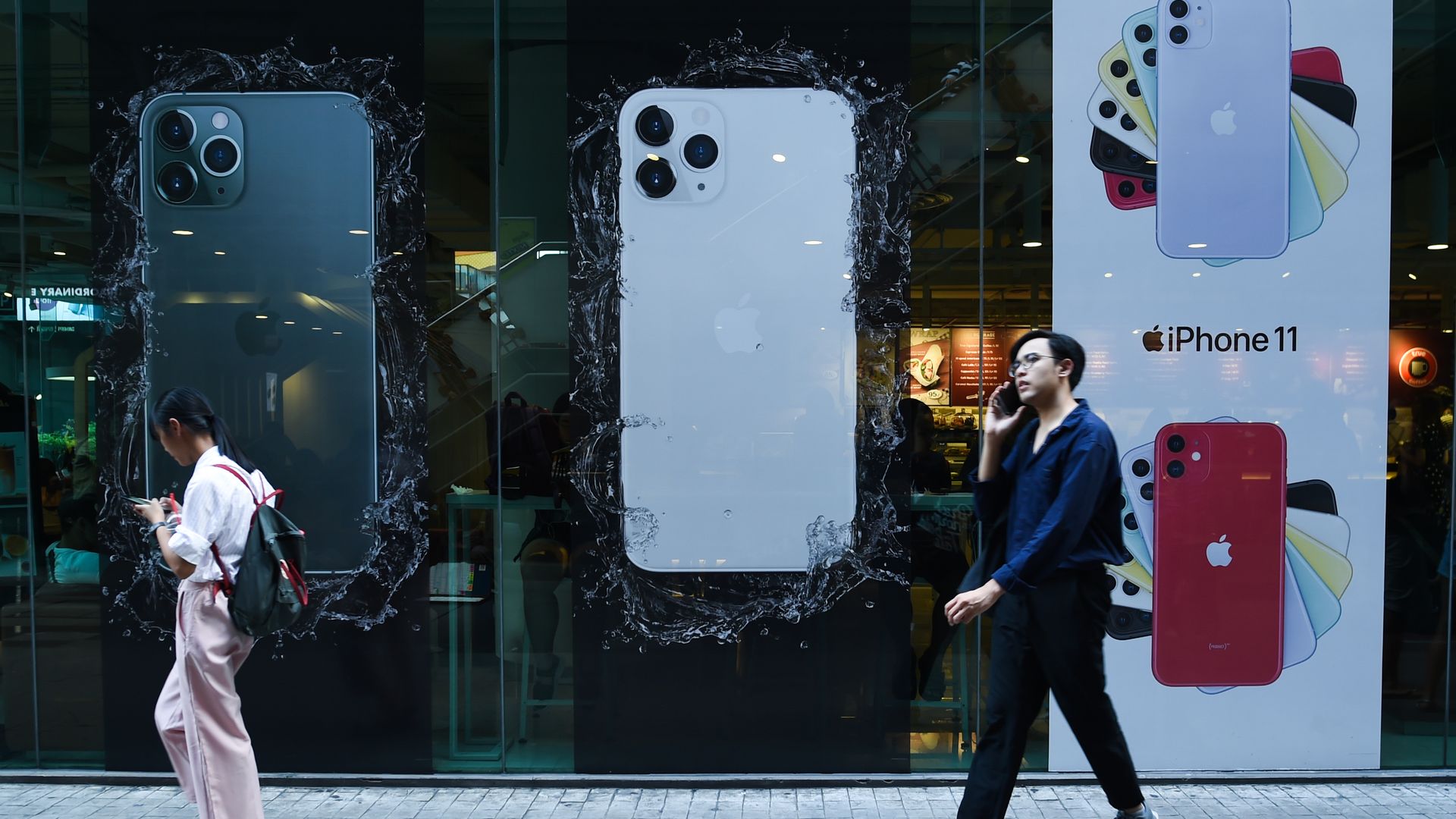 Ads for the iPhone 11 at a storefront
