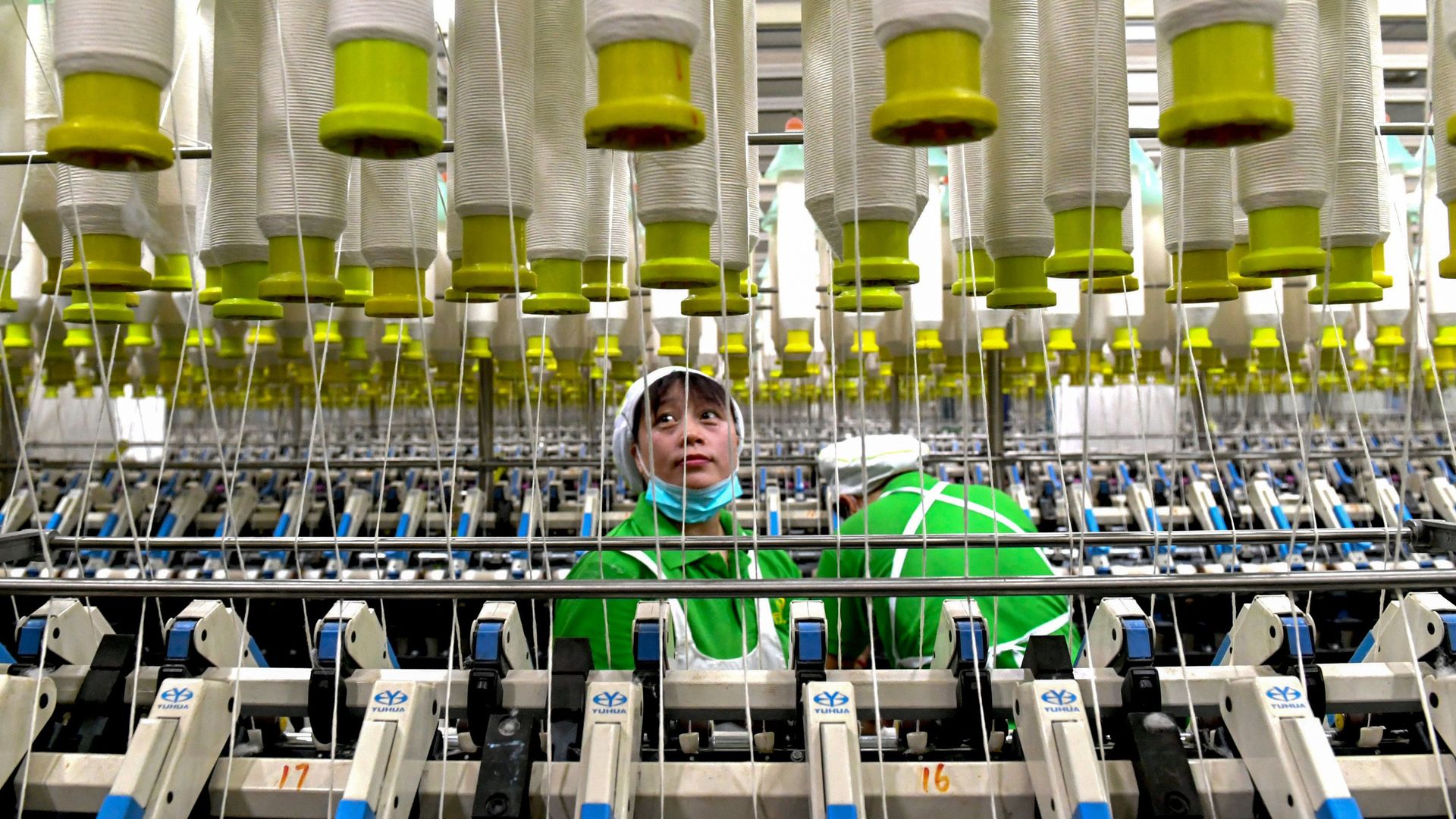 An employee works in a textile factory in Xiayi county in Shangqiu in China's central Henan province.
