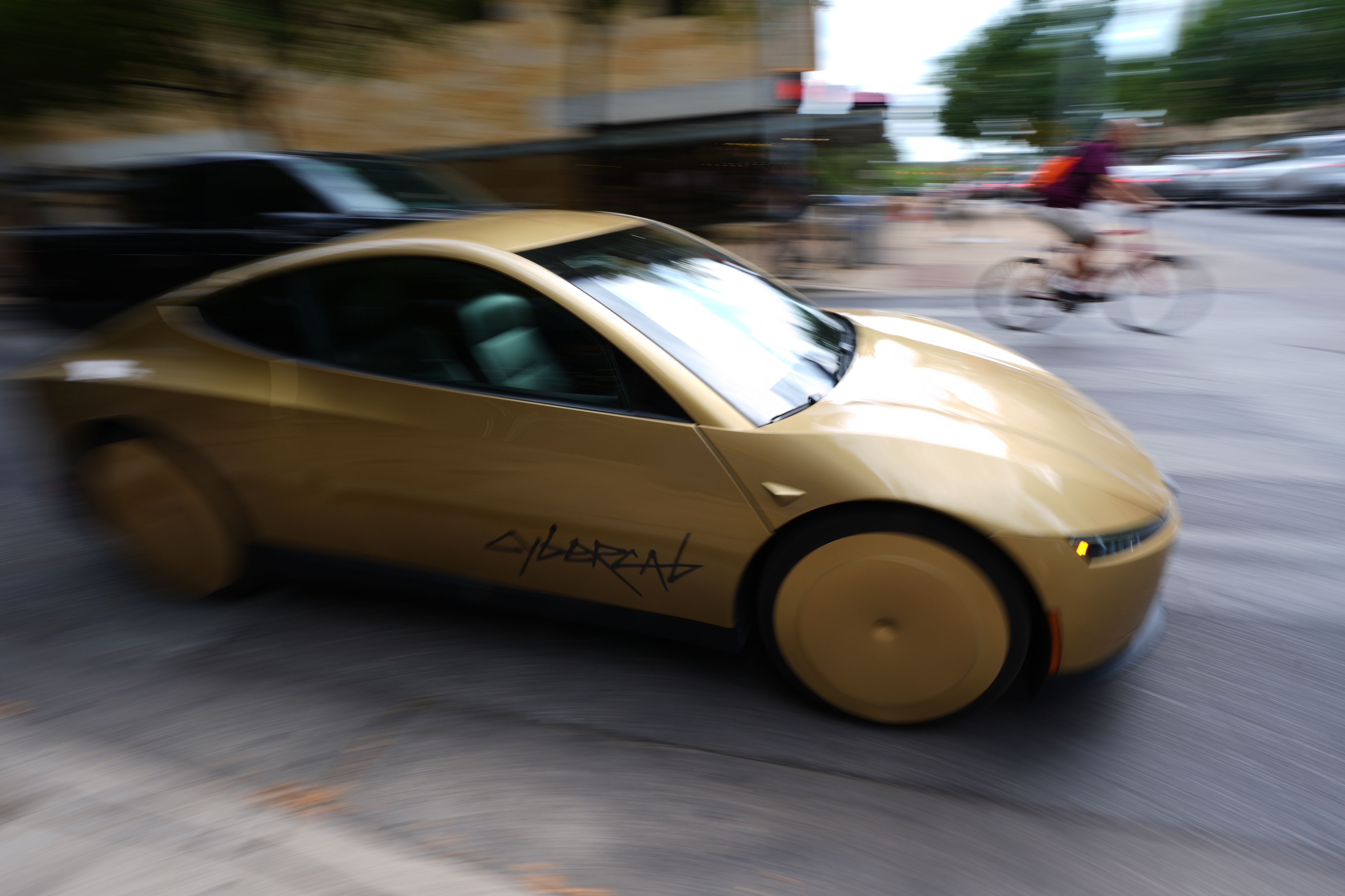 A Tesla Cybercab cruises through downtown Austin on Thursday. Photo: Eric Gay/AP