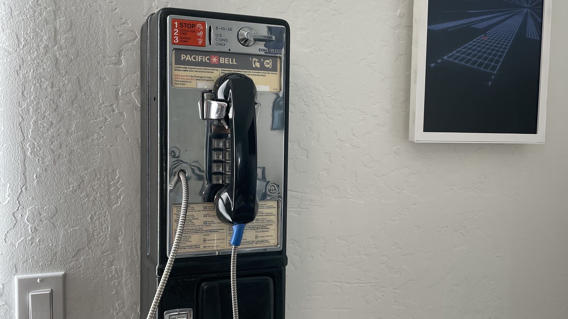 A pay phone in a home.