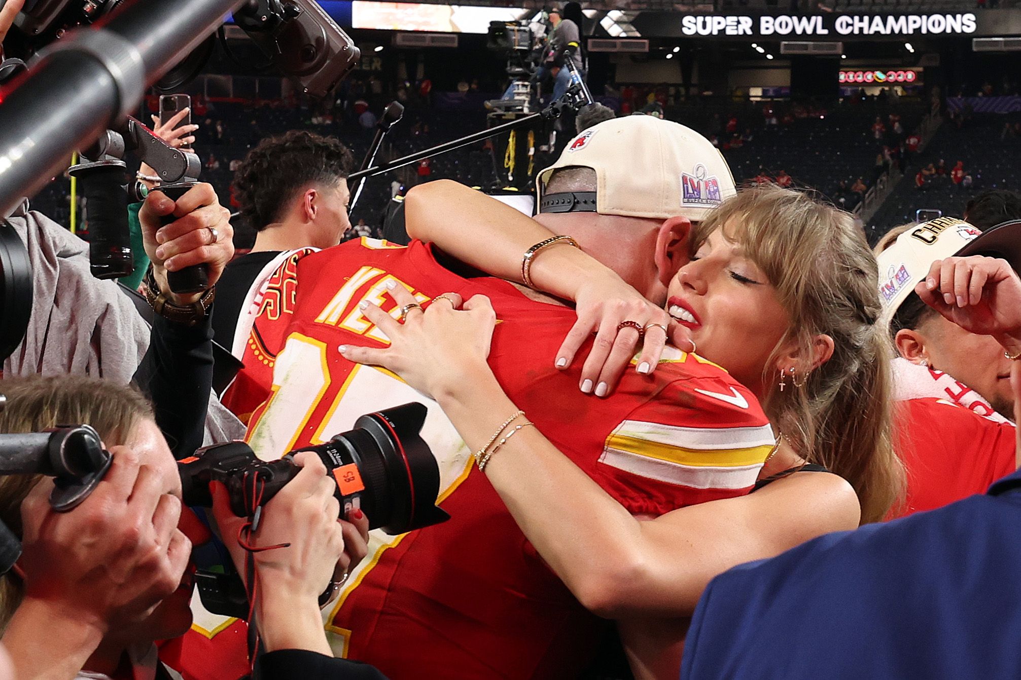 Travis Kelce #87 of the Kansas City Chiefs hugs Taylor Swift after defeating the San Francisco 49ers 25-22 during Super Bowl LVIII at Allegiant Stadium on February 11, 2024 in Las Vegas, Nevada. 