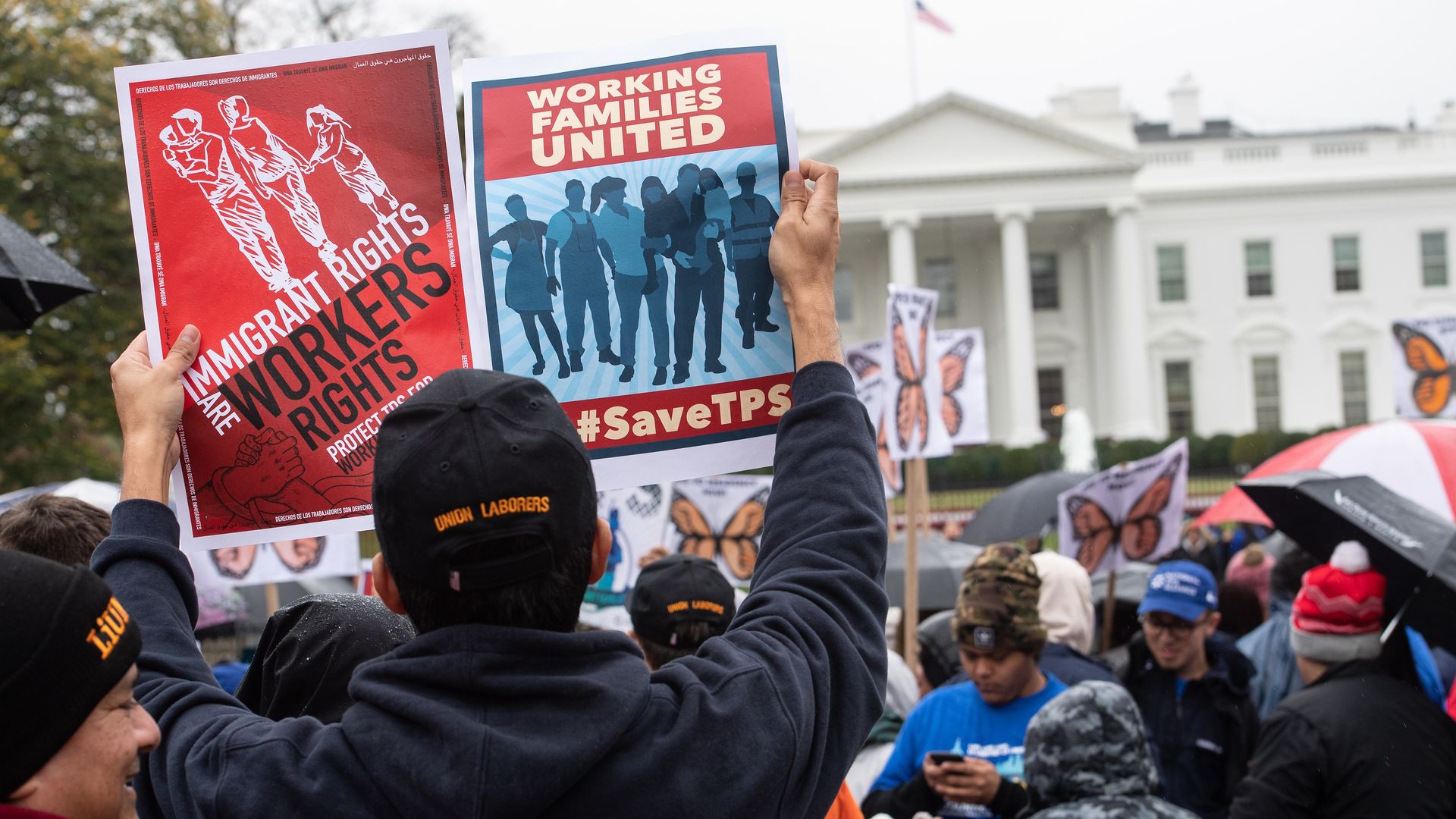 Demonstrators outside the White House protesting against the decision by the administration to terminate TPS for people from Sudan, El Salvador, Haiti and Nicaragua. 