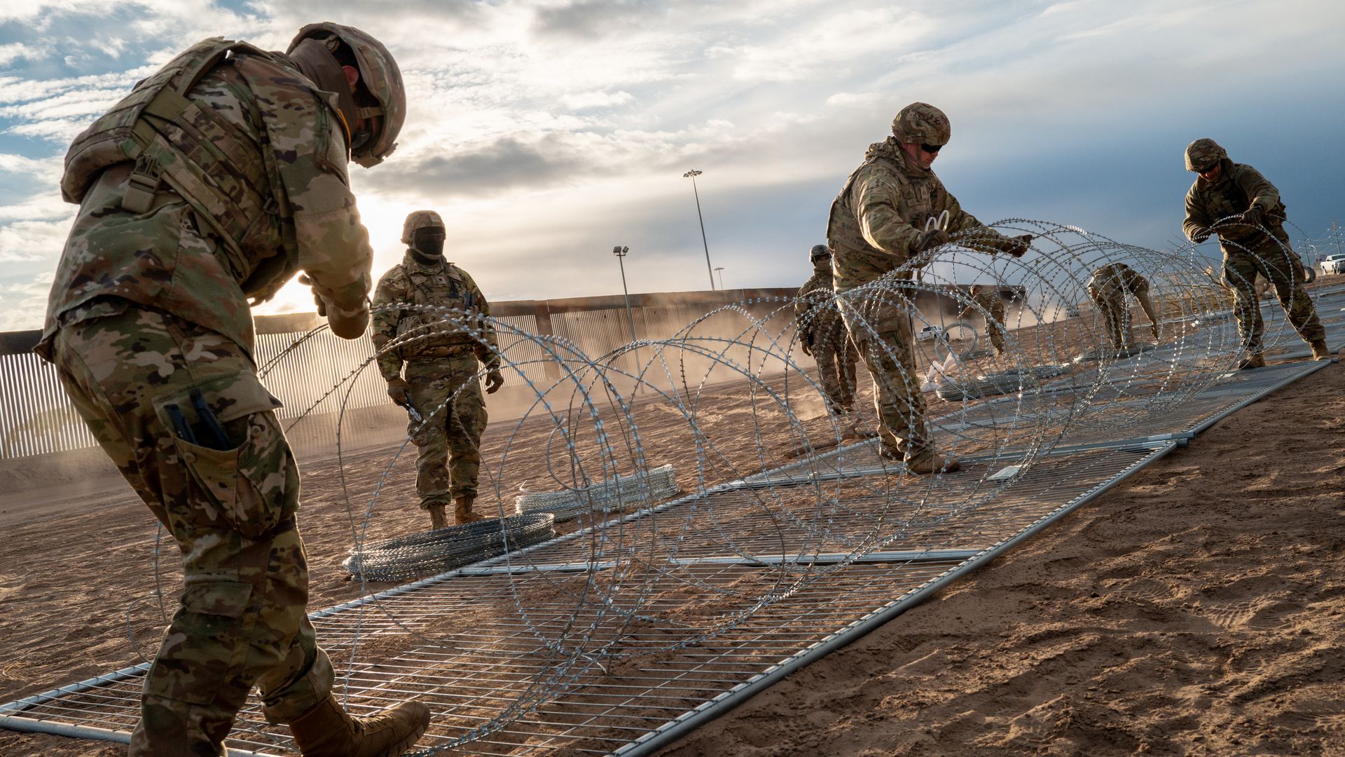 Texas National Guard soldiers install border fencing layered with concertina wire near the Rio Grande river on April 2, 2024 in El Paso, Texas. Photo: Brandon Bell/Getty Images