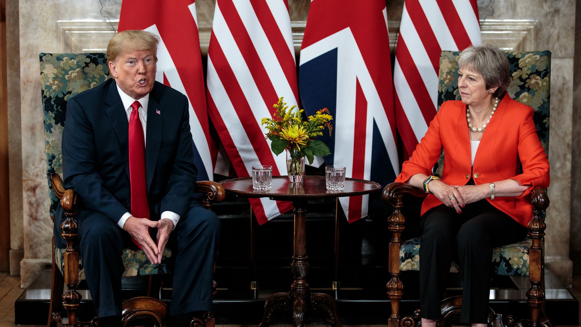 Trump and Theresa May sit together for a press conference