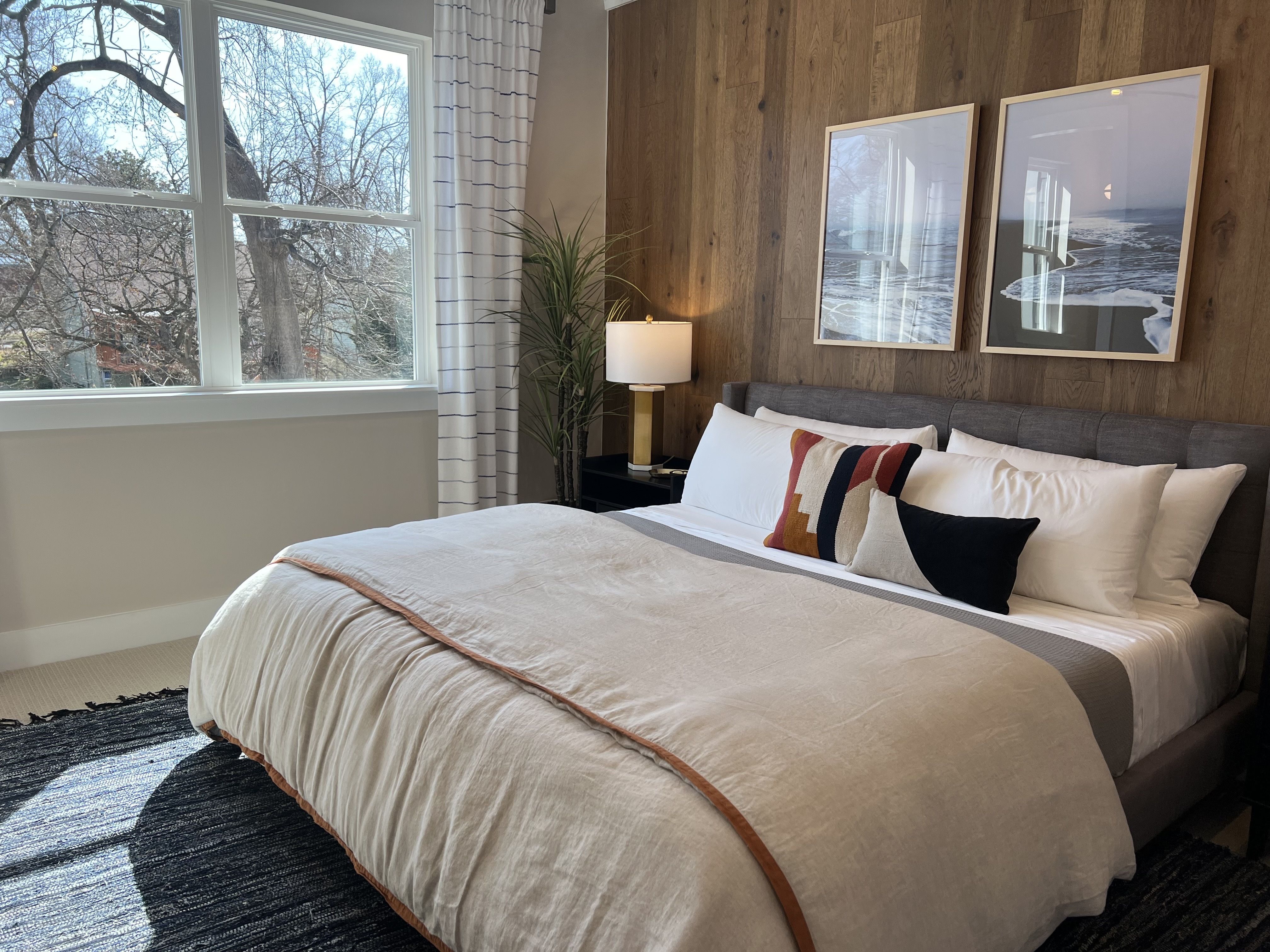 bedroom with wood wall