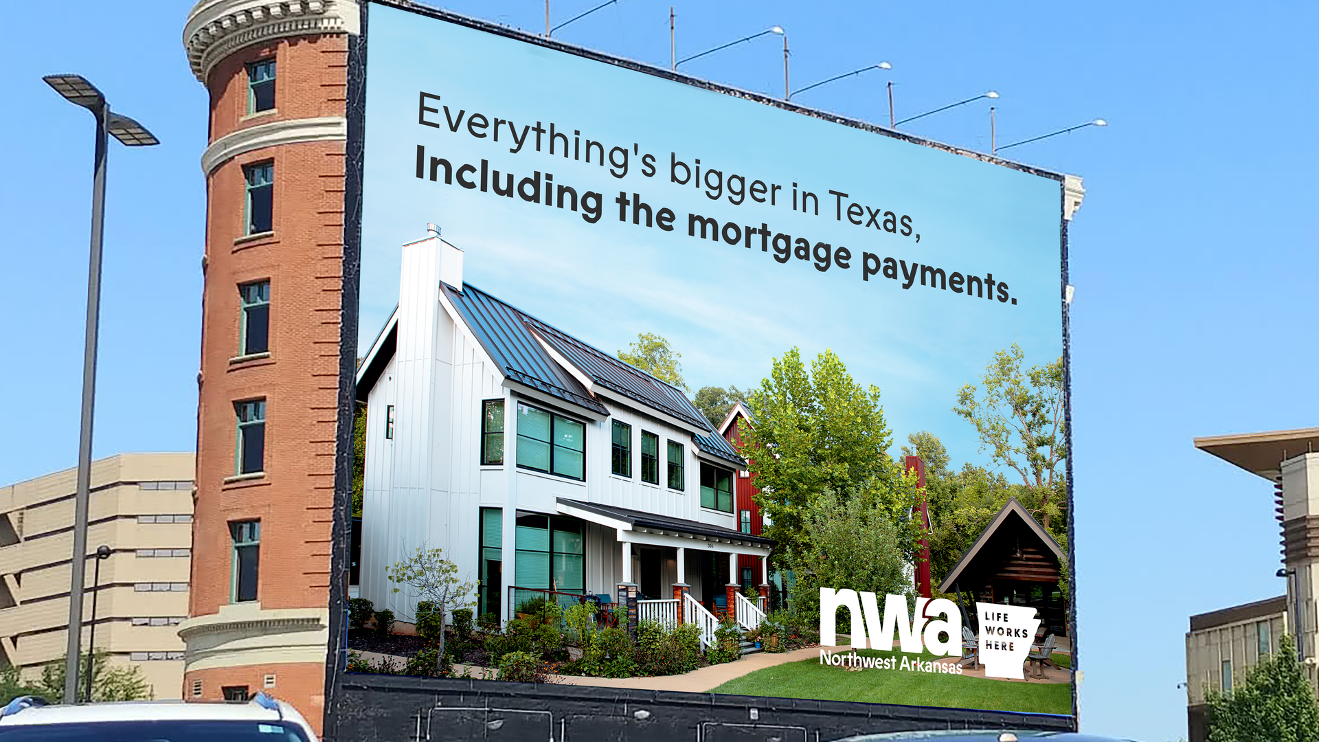 A billboard that reads Everything's bigger in Texas, including the mortgage payments.
