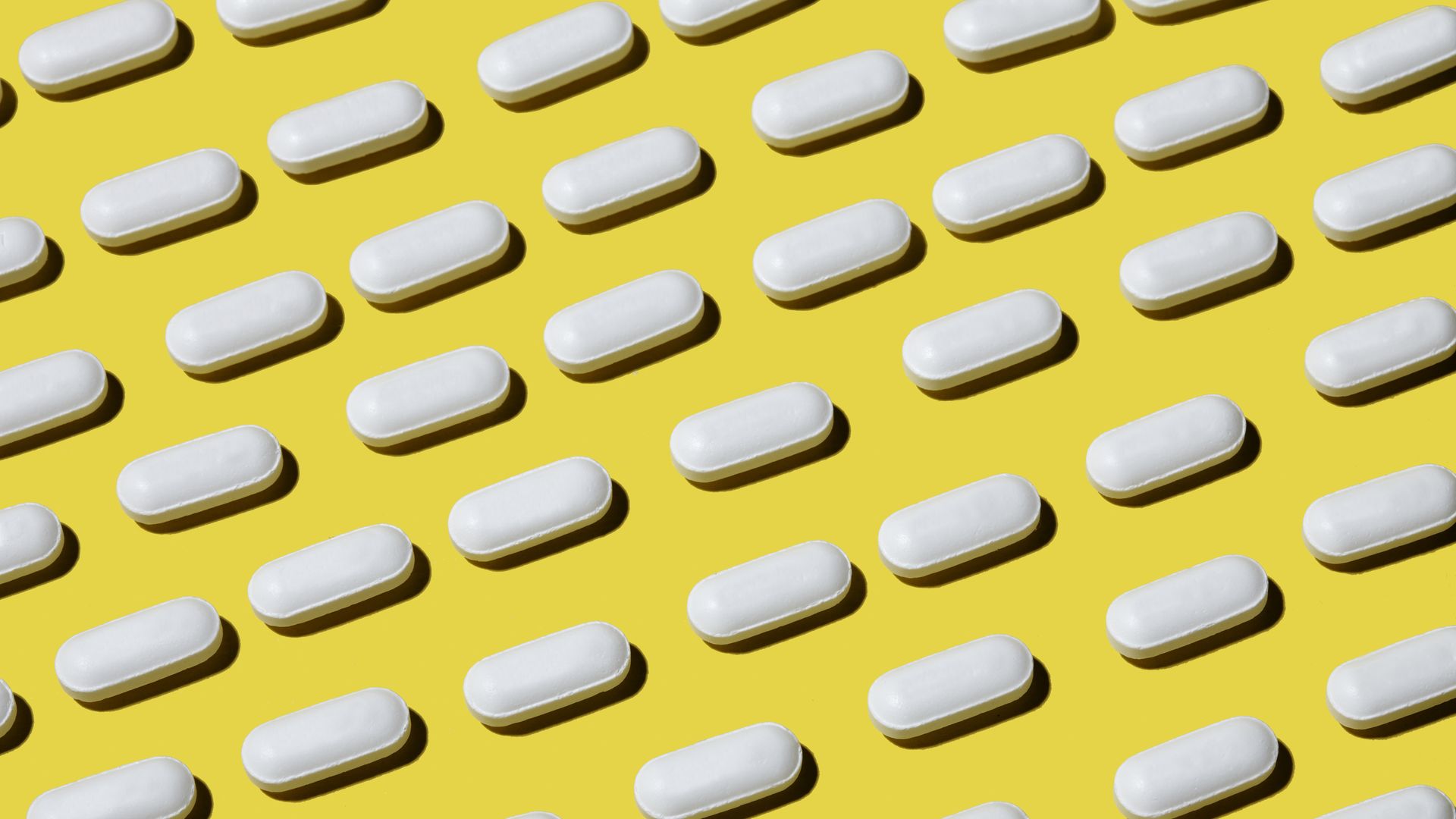 A group of pills are neatly organized.