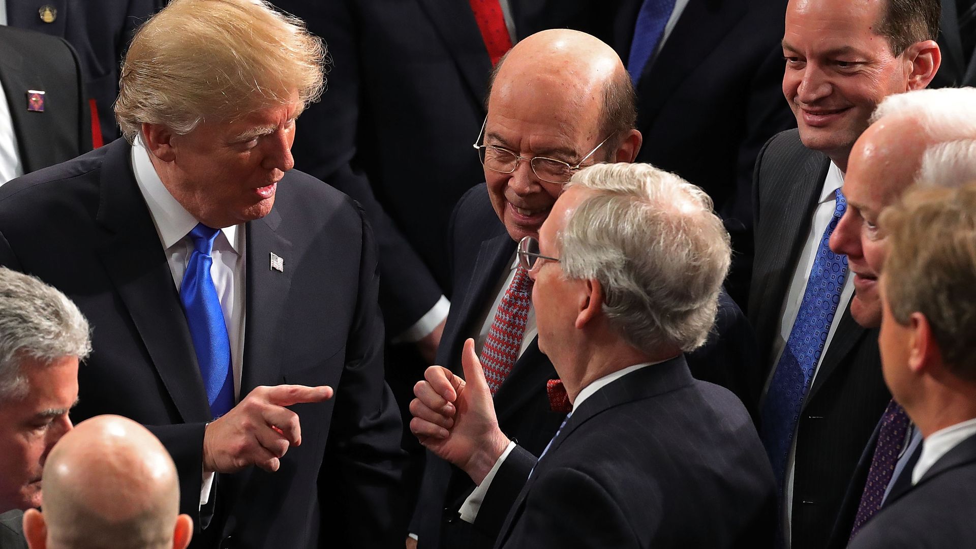 U.S. President Donald J. Trump talks with Senate Majority Leader Mitch McConnell. 