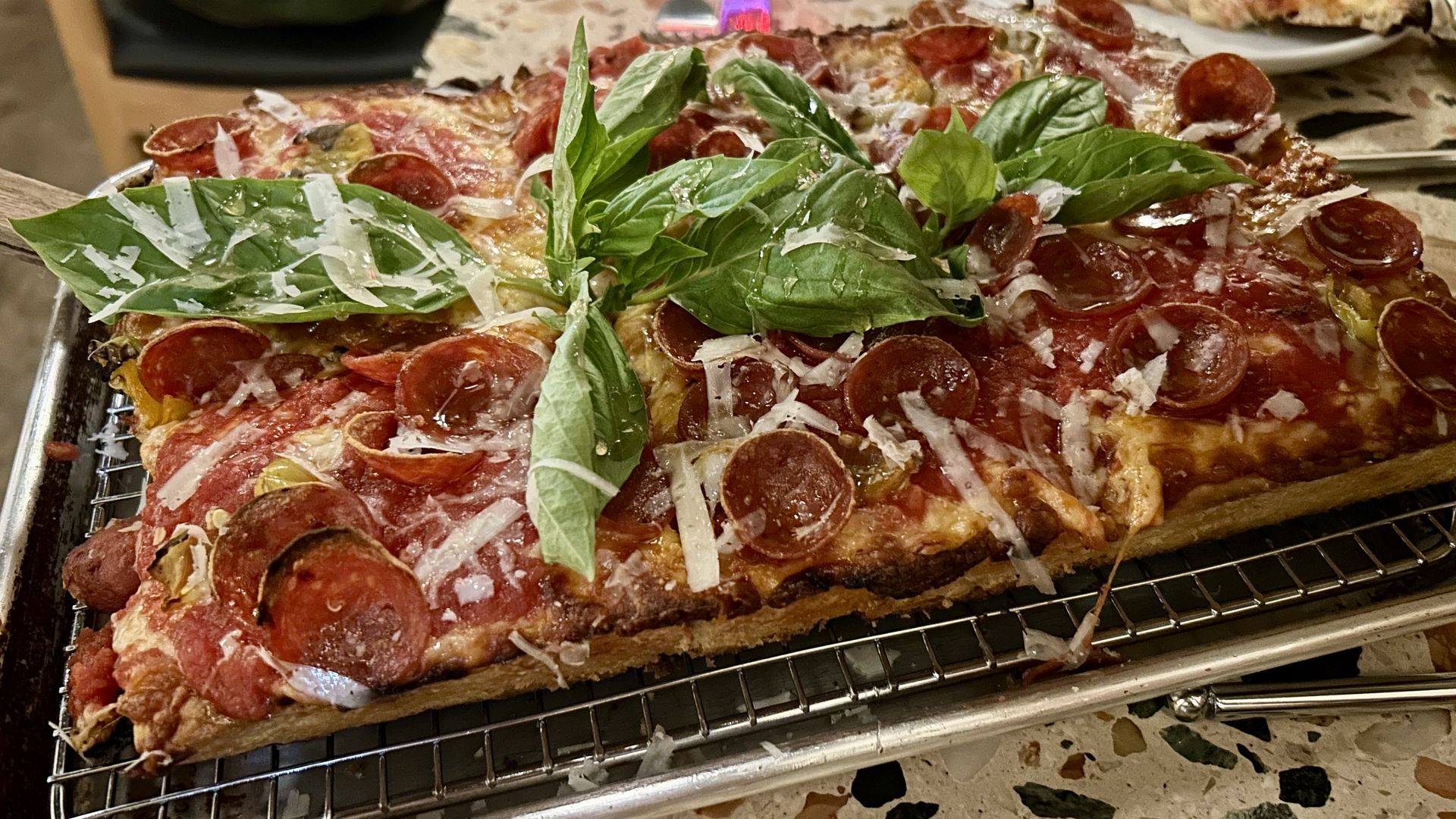 A square pepperoni pizza.
